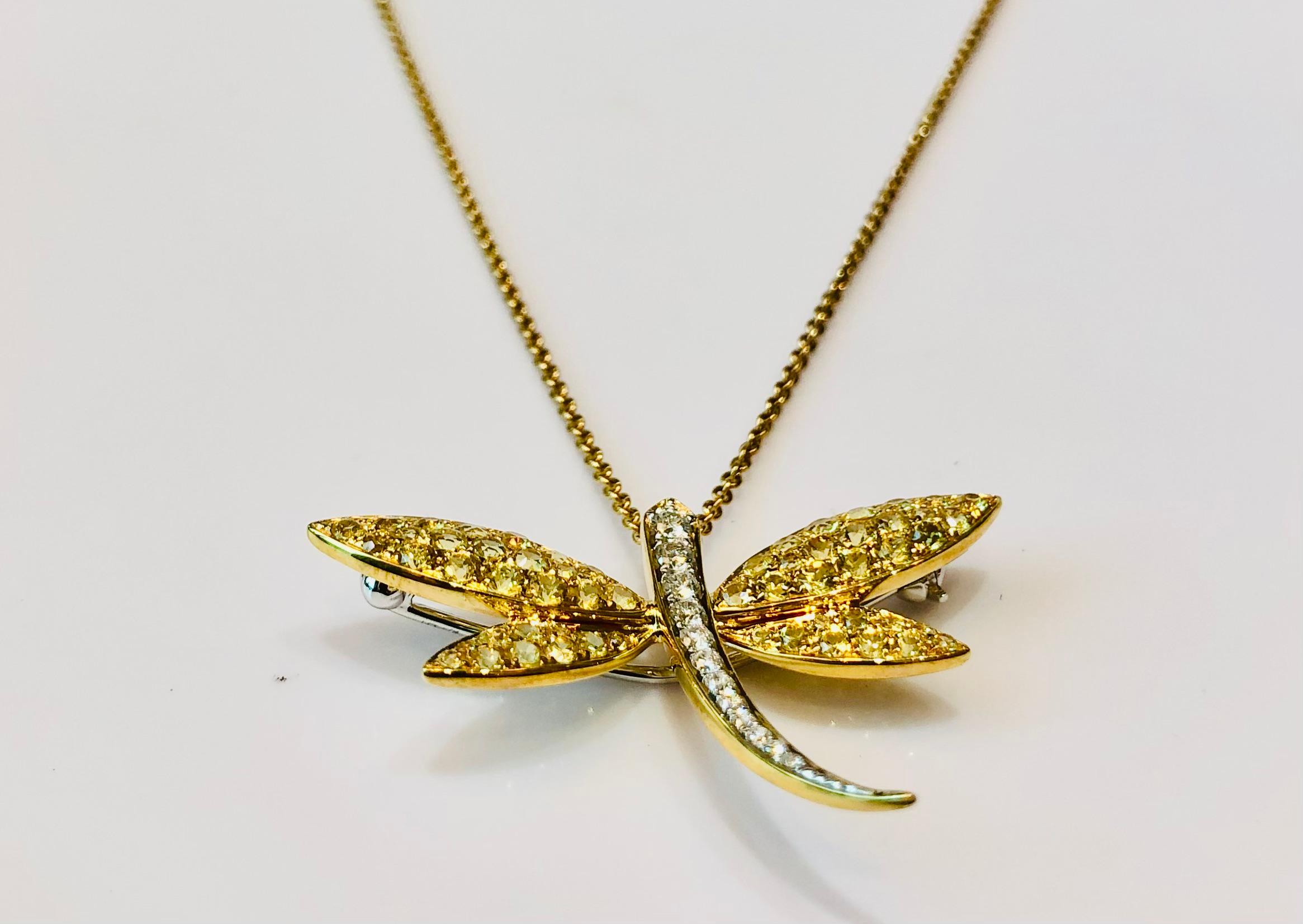 Yellow Saphires and Diamonds Dragonfly Pendant Brooche Necklace in 18k gold
Sapphires 45 brilliant cut  total 1.01 cts
Diamonds 38 FGVS  brilliant cut 0.45cts 
Gold total 7.05gr
Chain length at 42cm and extra clasp at 38cm

Irama Pradera is a