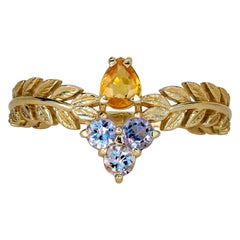 Goldring mit gelbem Saphir und 14 Karat Gold, Olivenblättern