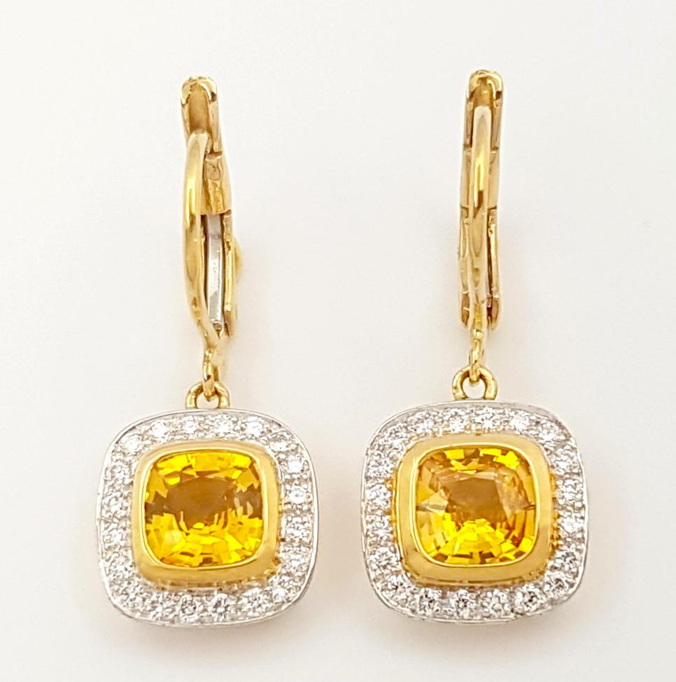 Yellow Sapphire 2.17 carats with Diamond 0.38 carat Earrings set in 18K Gold Settings

Width: 1.2 cm 
Length: 2.6 cm
Total Weight: 5.82 grams

