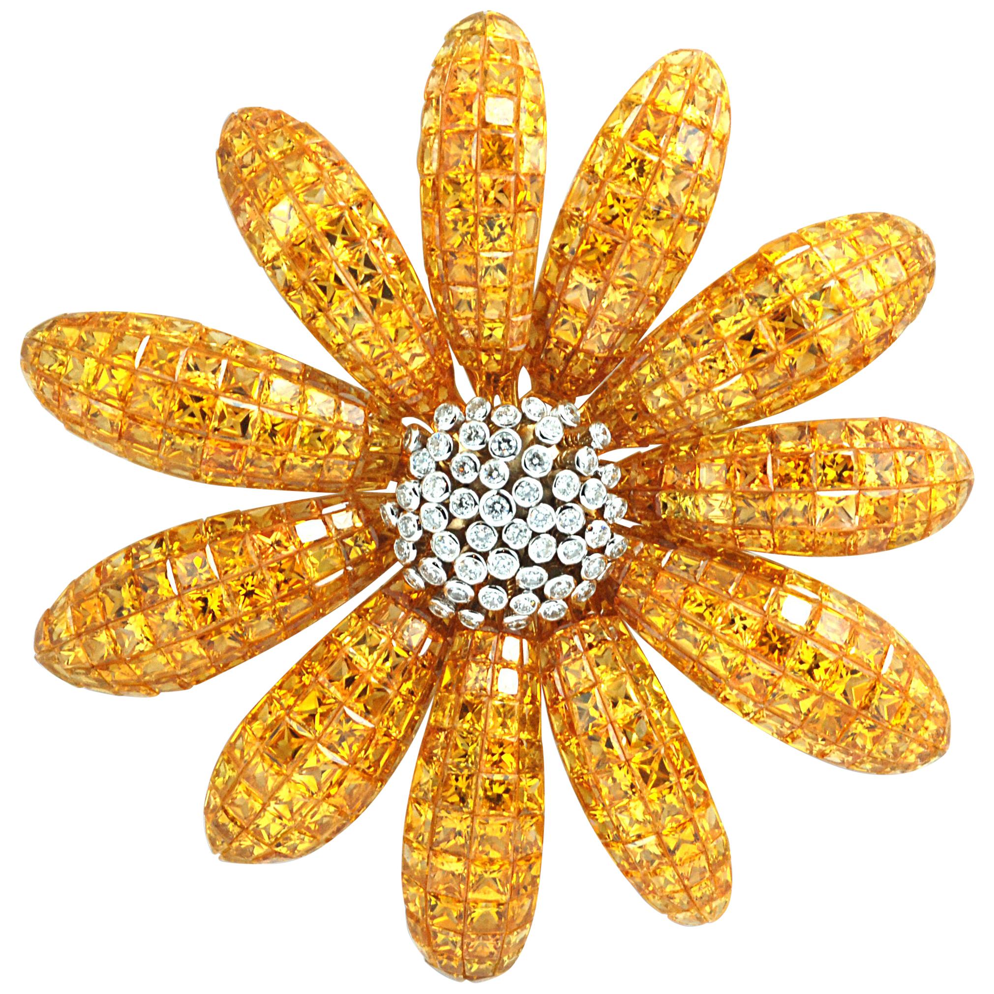 Blumenbrosche aus 18 Karat Gold mit gelbem Saphir und unsichtbarer Fassung mit Diamant 