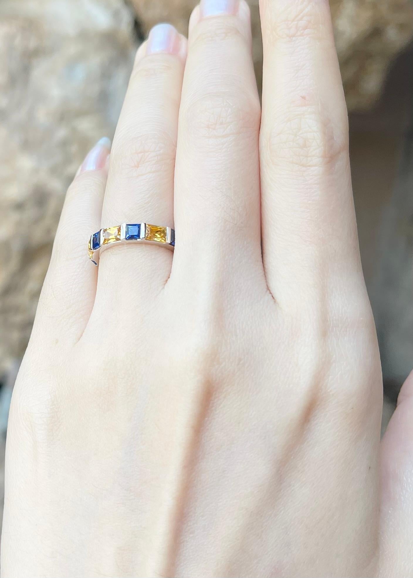 Gelber Saphir 2,56 Karat und blauer Saphir 1,48 Karat Ewigkeitsring in 18K Weißgoldfassung

Breite:  2.0 cm 
Länge: 0,4 cm
Ringgröße: 49
Gesamtgewicht: 3.91 Gramm

