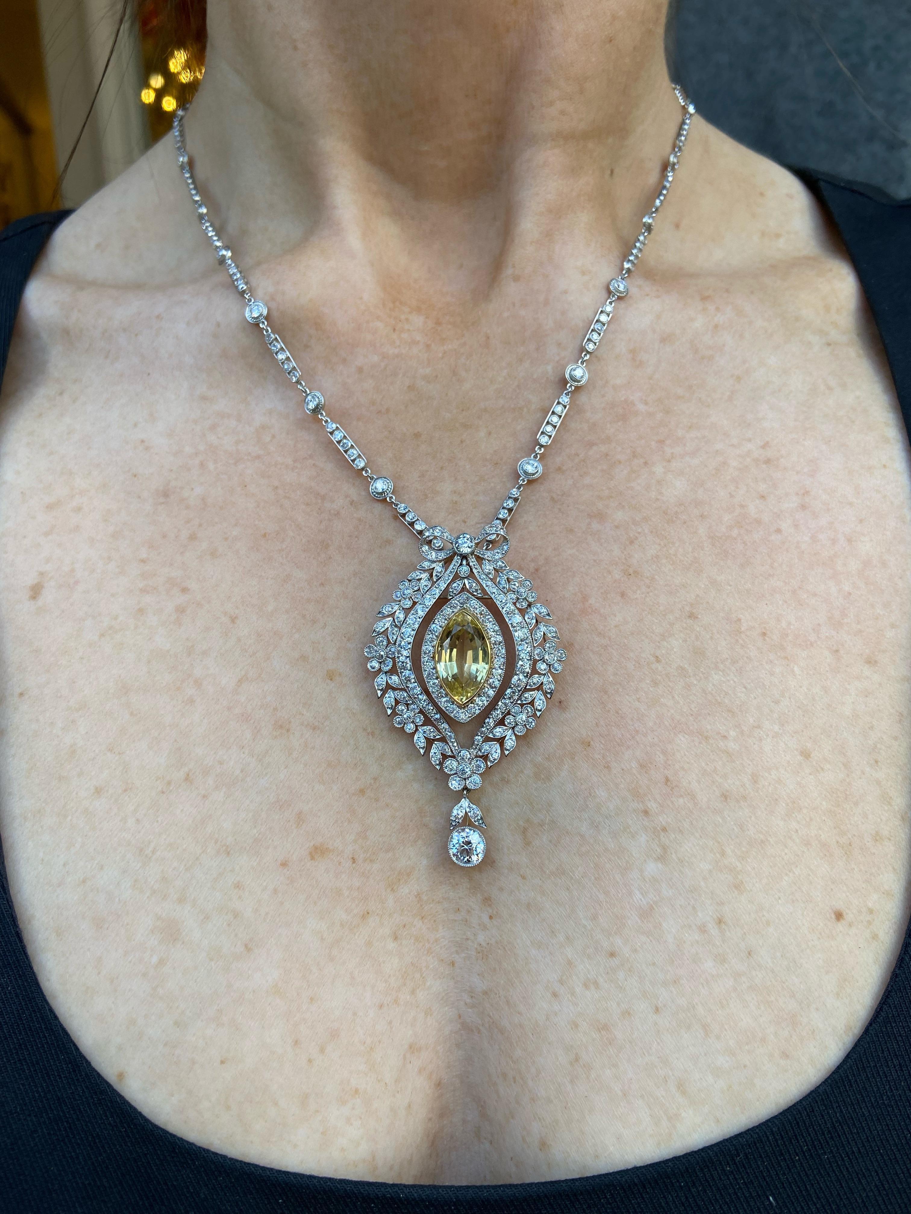 Women's Yellow Sapphire and Diamond 1890's Estate Pendant Necklace/Brooch in Platinum For Sale