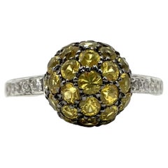 Bague boule en or blanc 18 carats avec saphir jaune et diamants