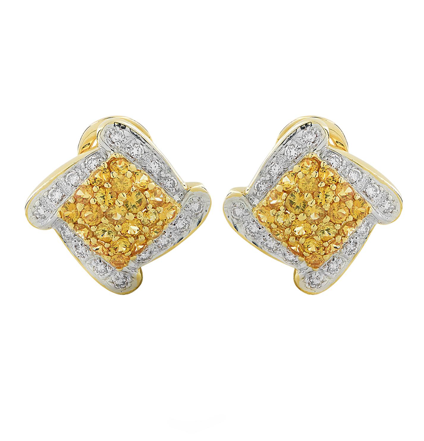 Beautiful earrings crafted in 18 karat yellow and white gold featuring approximately 42 yellow sapphires weighing approximately 1 carat total and 32 round brilliant cut diamonds weighing approximately .25 carats total, G color, VS clarity. Yellow