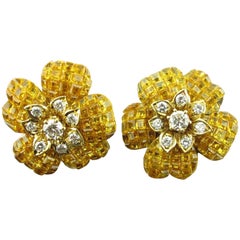 Vintage Yellow Sapphire and Diamond Flower Earrings set in 18 karat yellow gold