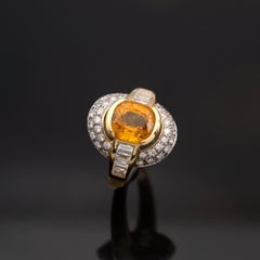 Goldring mit gelbem Saphir und Diamant