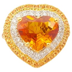 Yellow Sapphire and Diamond Ring set in 18K Gold Settings