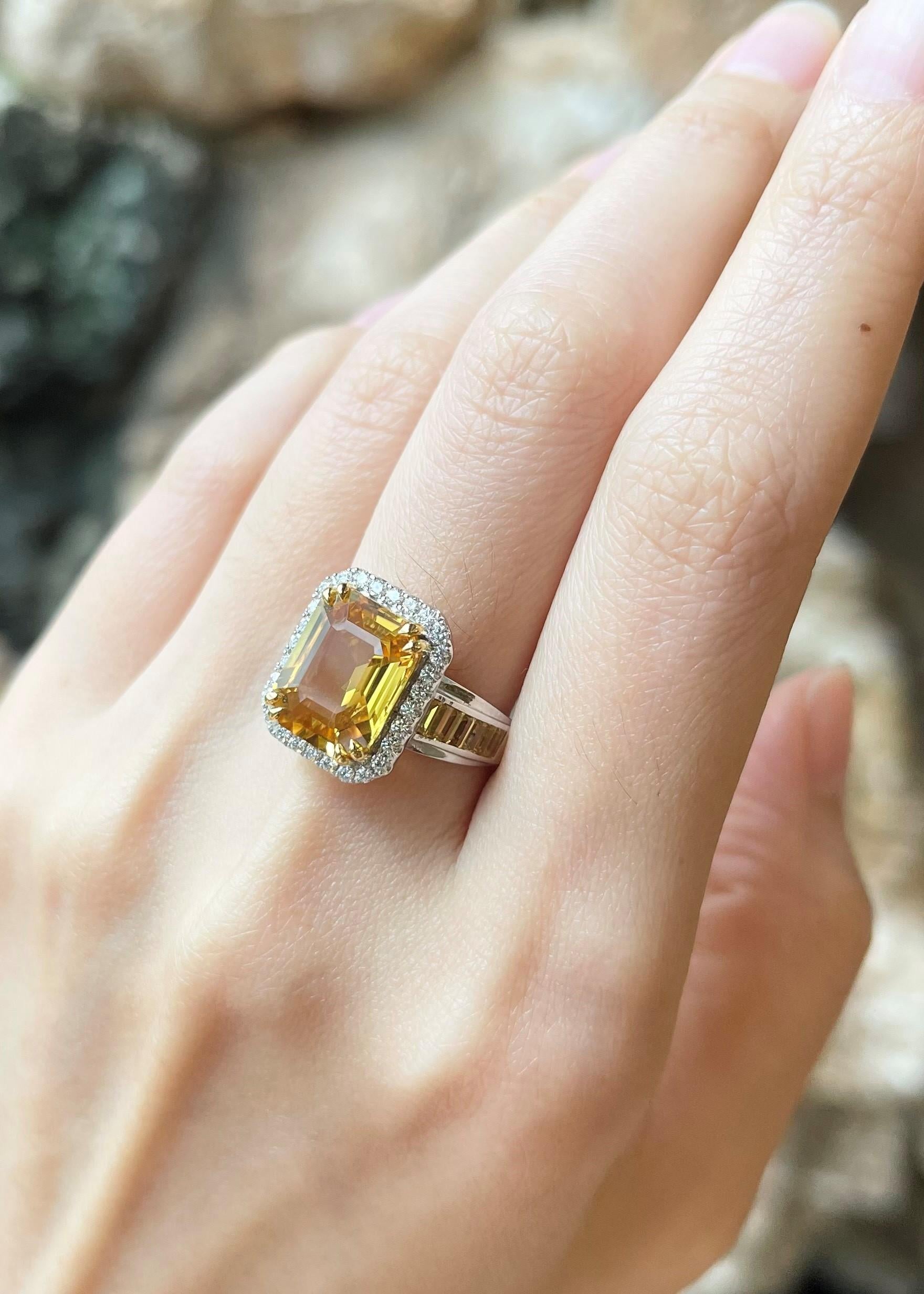 Emerald Cut Yellow Sapphire and Diamond Ring set in 18K White Gold Settings For Sale