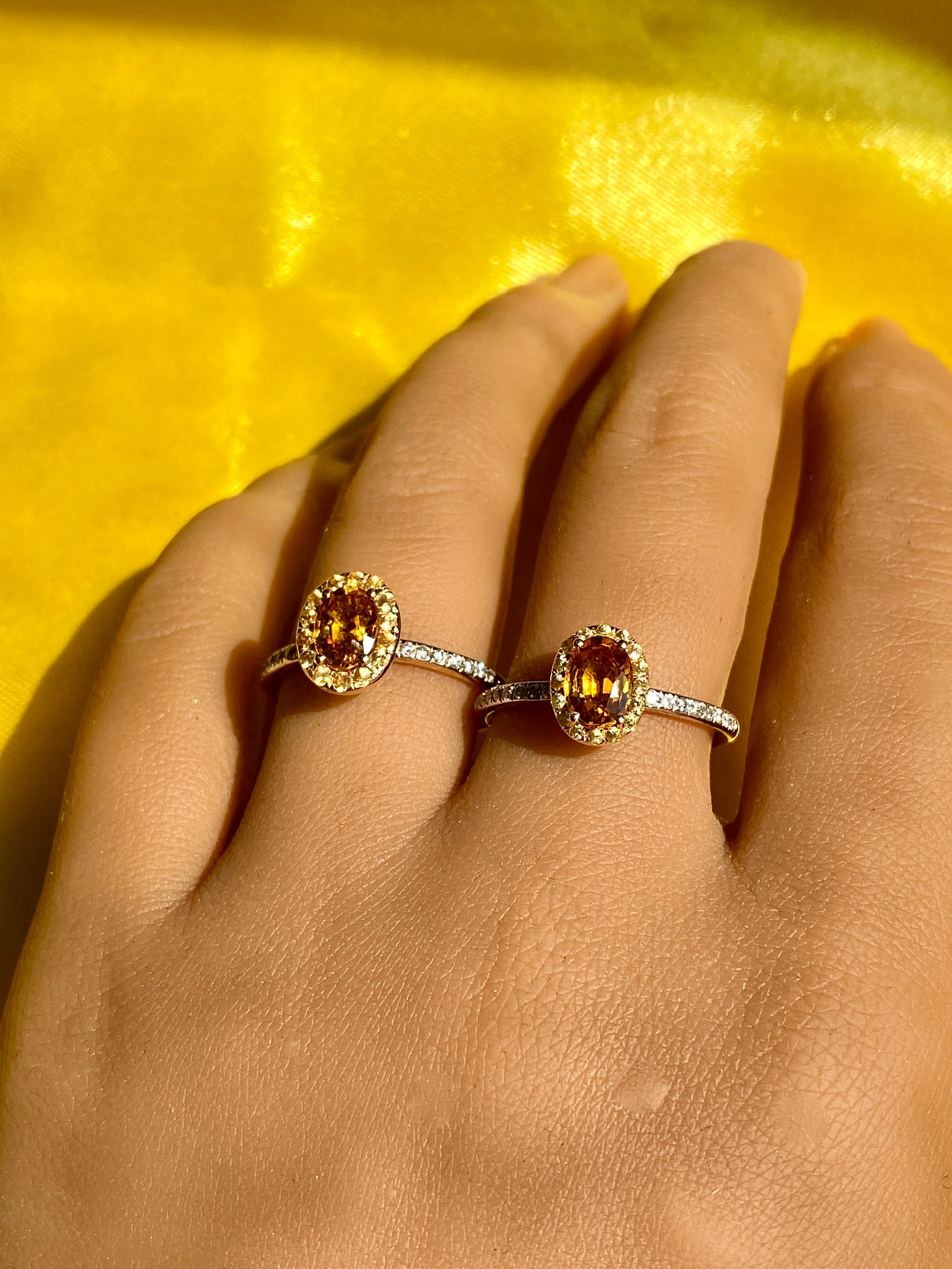 Our most loved design! The yellow and orange sapphire rings are perfect for the sun kissed days that lie ahead of us! Diamonds on the shank, sapphires in the center and on the halo, be ready for your beach day photoshoot with these rings!