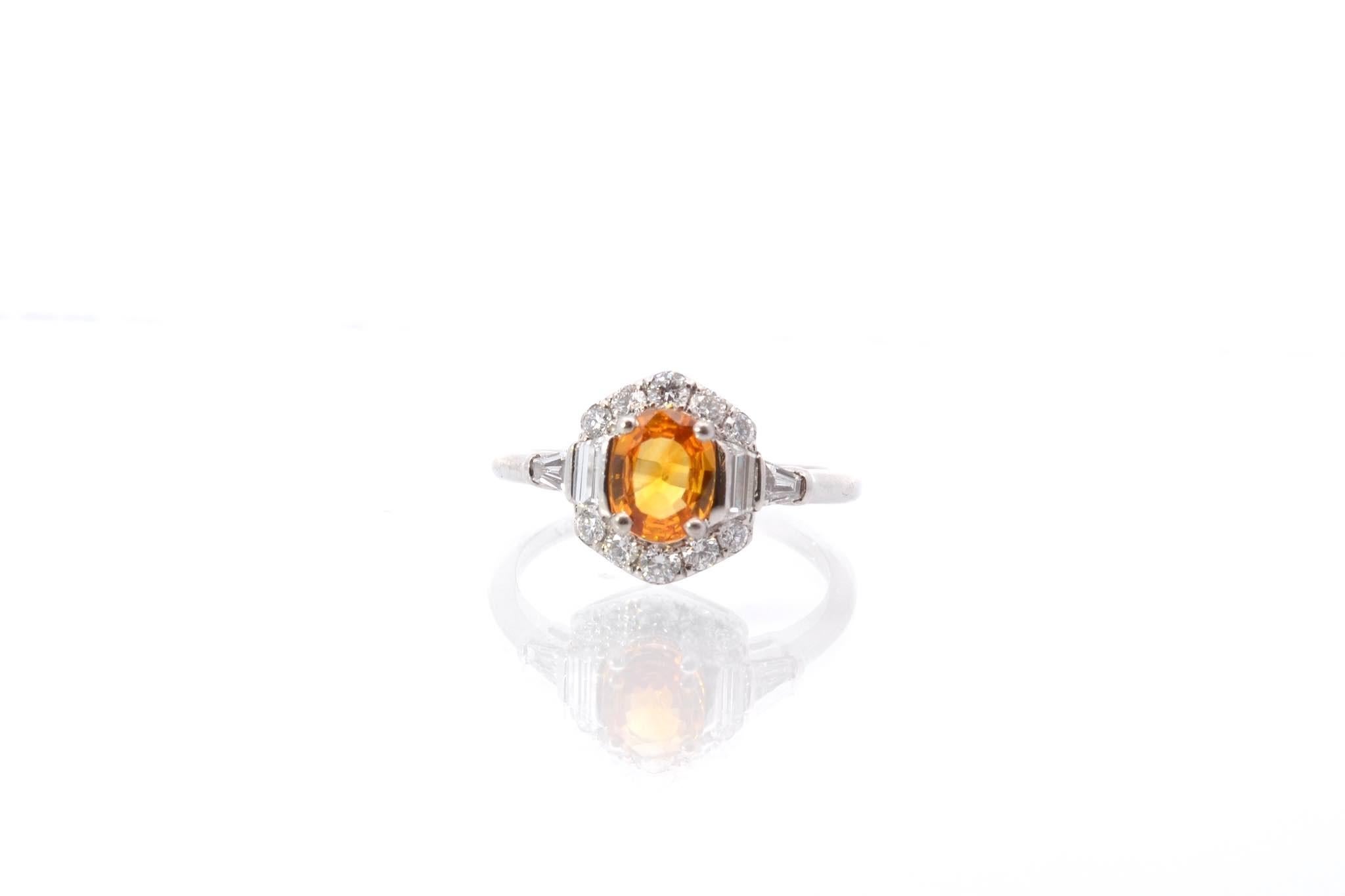 Stones: Yellow sapphire: 0.76 ct, 10 diamonds: 0.35 ct and 4 baguette diamonds: 0.26 ct
Material: 18k white gold
Dimensions: 1 x 0.9cm
Weight: 3.3g
Period: Recent vintage style
Size: 51 (free sizing) 
Certificate
Ref. : 25563