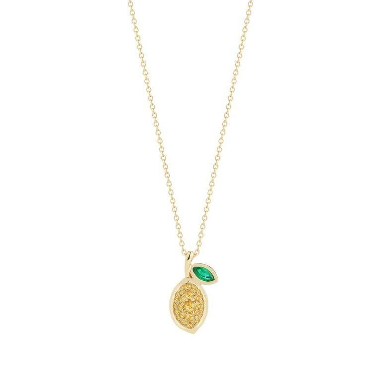 This Yellow Sapphire and Emerald Lemon Necklace is your new favorite summer piece! 

This lemon necklace has 27 hand set yellow sapphires and an emerald leaf accent. 

. .34ct yellow sapphire 
. .11ct emerald 
. 18