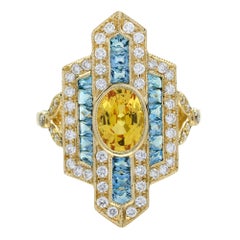 Esstellerring aus 18 Karat Gold mit gelbem Saphir, Aquamarin und Diamant im Art-déco-Stil