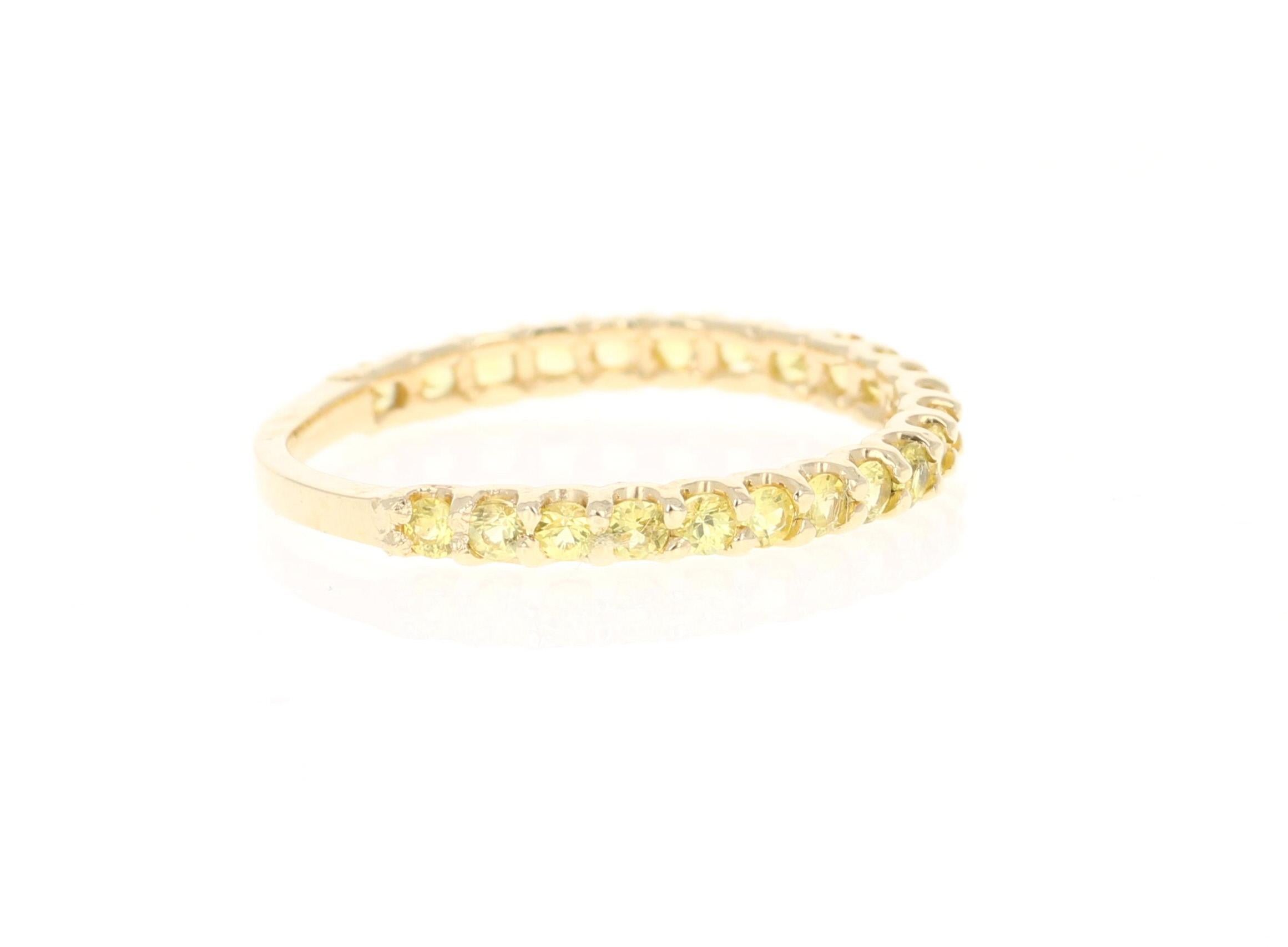 This ring has 23 Natural Round Cut Yellow Sapphires that weigh 0.75 Carats. 

Crafted in 14 Karat Yellow Gold and weighs approximately 1.3 grams 

The ring is a size 7 and can be re-sized at no additional charge!
