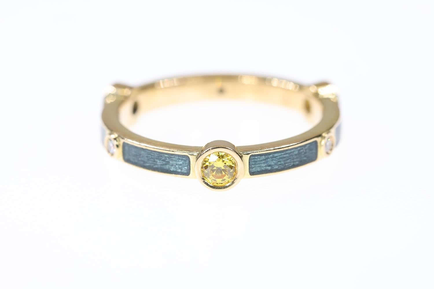 This beautifully designed Yellow Sapphire & Diamond 18K yellow gold ring is made with the finest Yellow Sapphires, Gold Alloy, and Diamonds. The ring features 3 beautiful G/H VS1 diamonds that are 1.5mm in diameter and 3 Rich Yellow 3.0mm Sapphires.