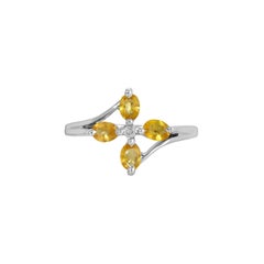 Anello con fiore di diamante e zaffiro giallo