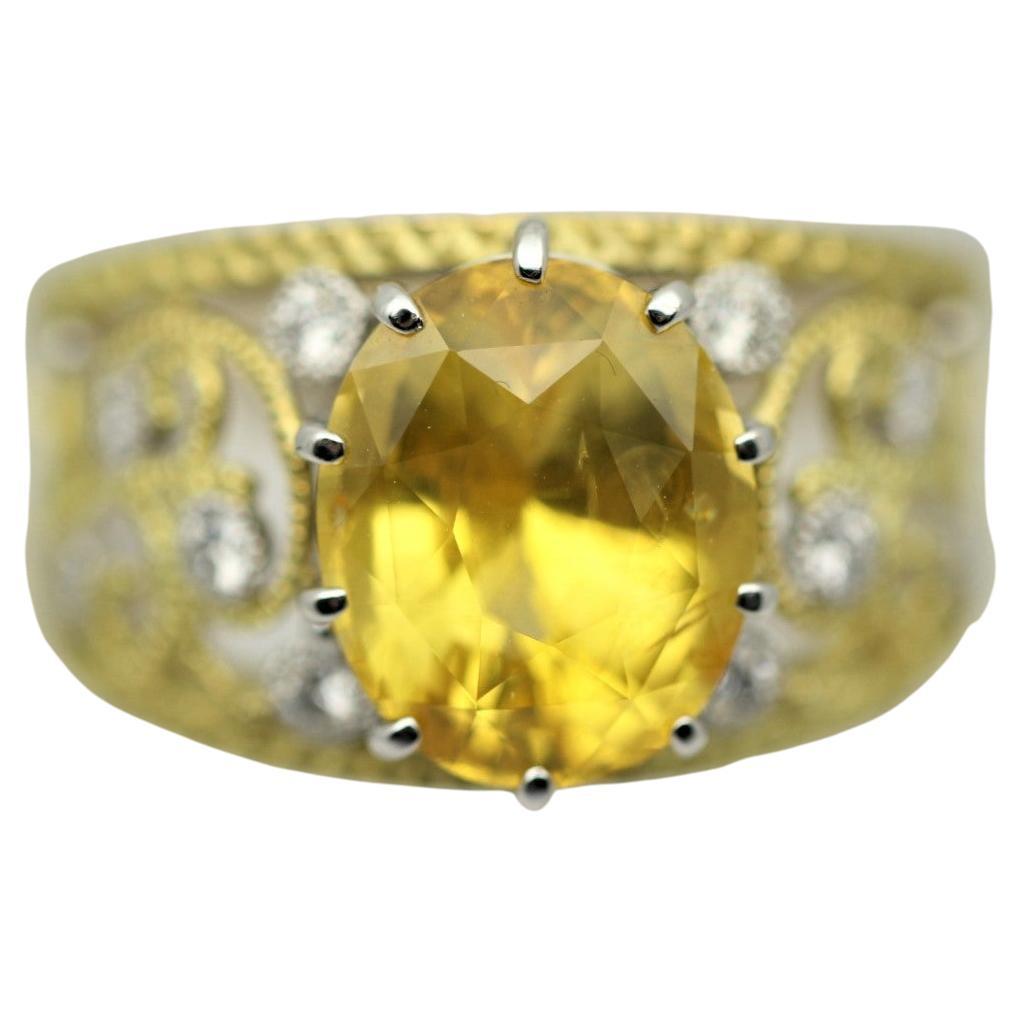 Zweifarbiger Ring aus Gold und Platin mit gelbem Saphir und Diamant