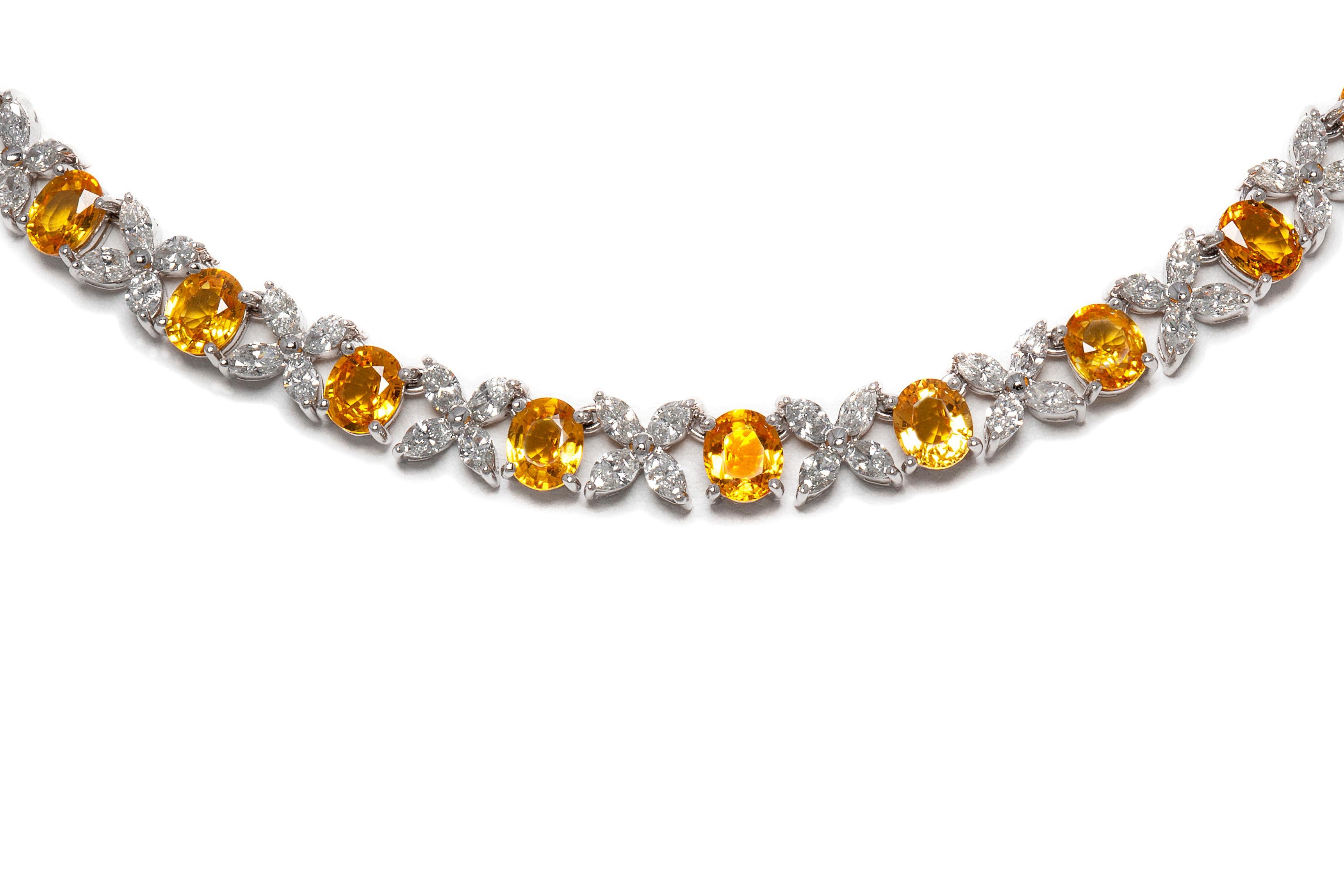 Necklace, finely crafted in 18k white gold with diamonds weighing a total of 10.81 carats and yellow sapphires weighing a total of 29.36 carats. Circa 2000.