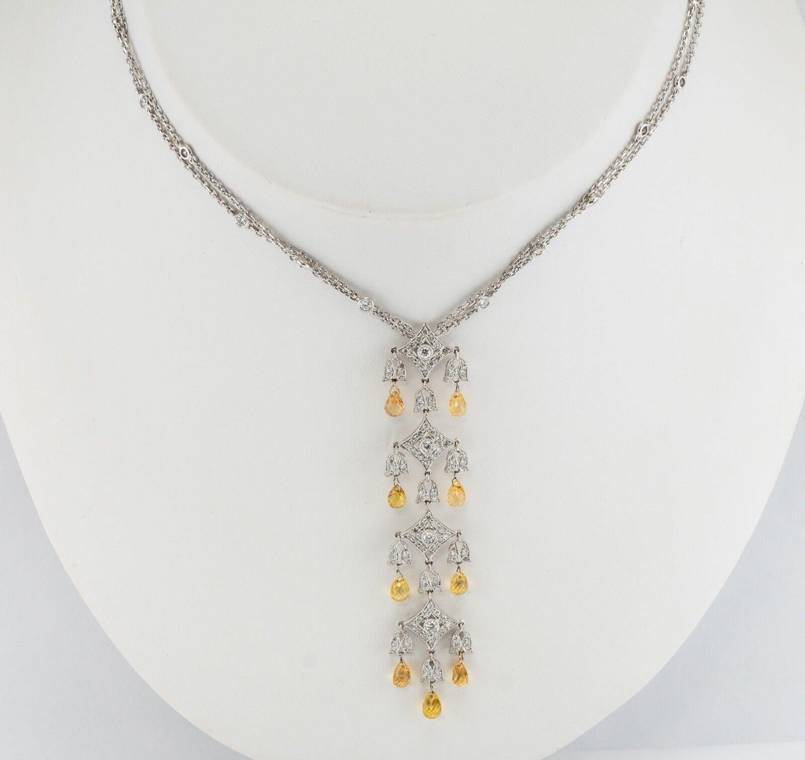 Yellow Sapphire Diamond Necklace Pendant 18K White  Gold 1.85 TDW
This amazing necklace is finely crafted in solid 18K White gold. The center piece is studded with 124 white and fiery diamonds and nine Yellow Sapphire briolettes measuring 5mm. 48