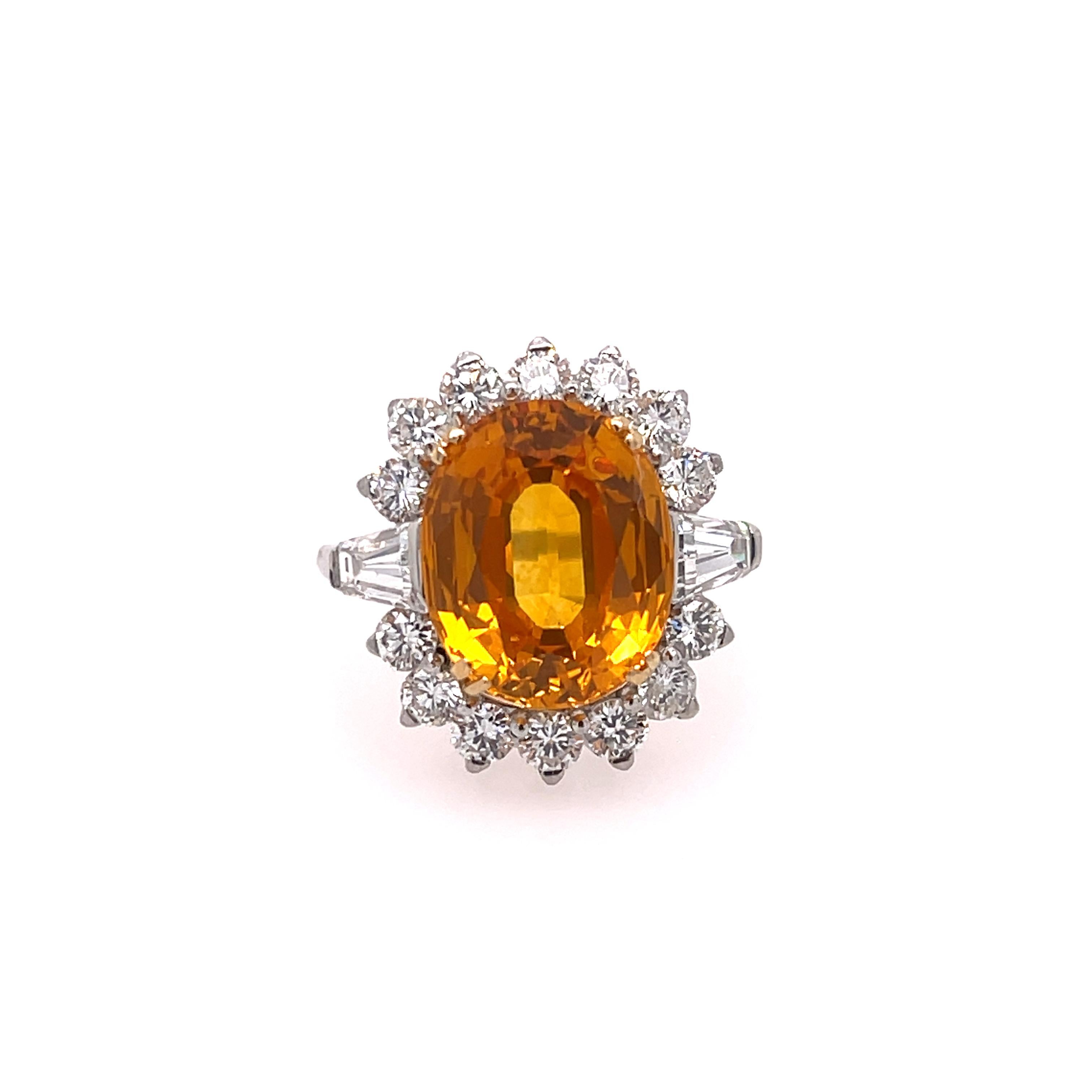 Estate Yellow Sapphire (GIA Certified) & Diamond Platinum Ring. The ring features a 7.10ct oval yellow sapphire and 1.50ctw of diamonds.  Finger size 7.50, can be sized. Circa 1960s.

7.7grams