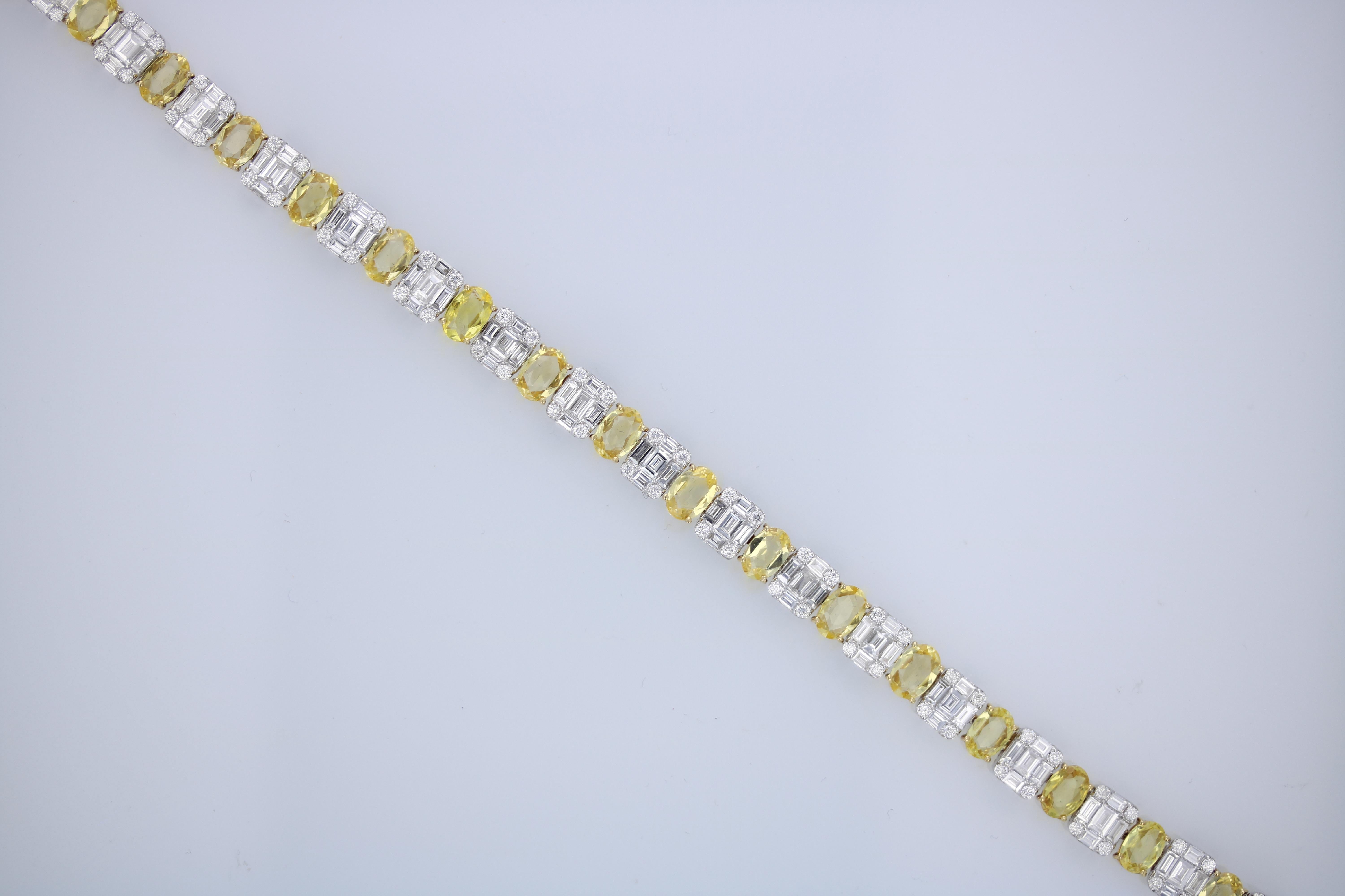 This contemporary tennis bracelet features more than seven carats of yellow sapphires that alternate with invisibly-set diamond clusters. 

The bracelet contains 18 oval-cut sapphires weighing approximately 7.61 carats together. The sapphires are