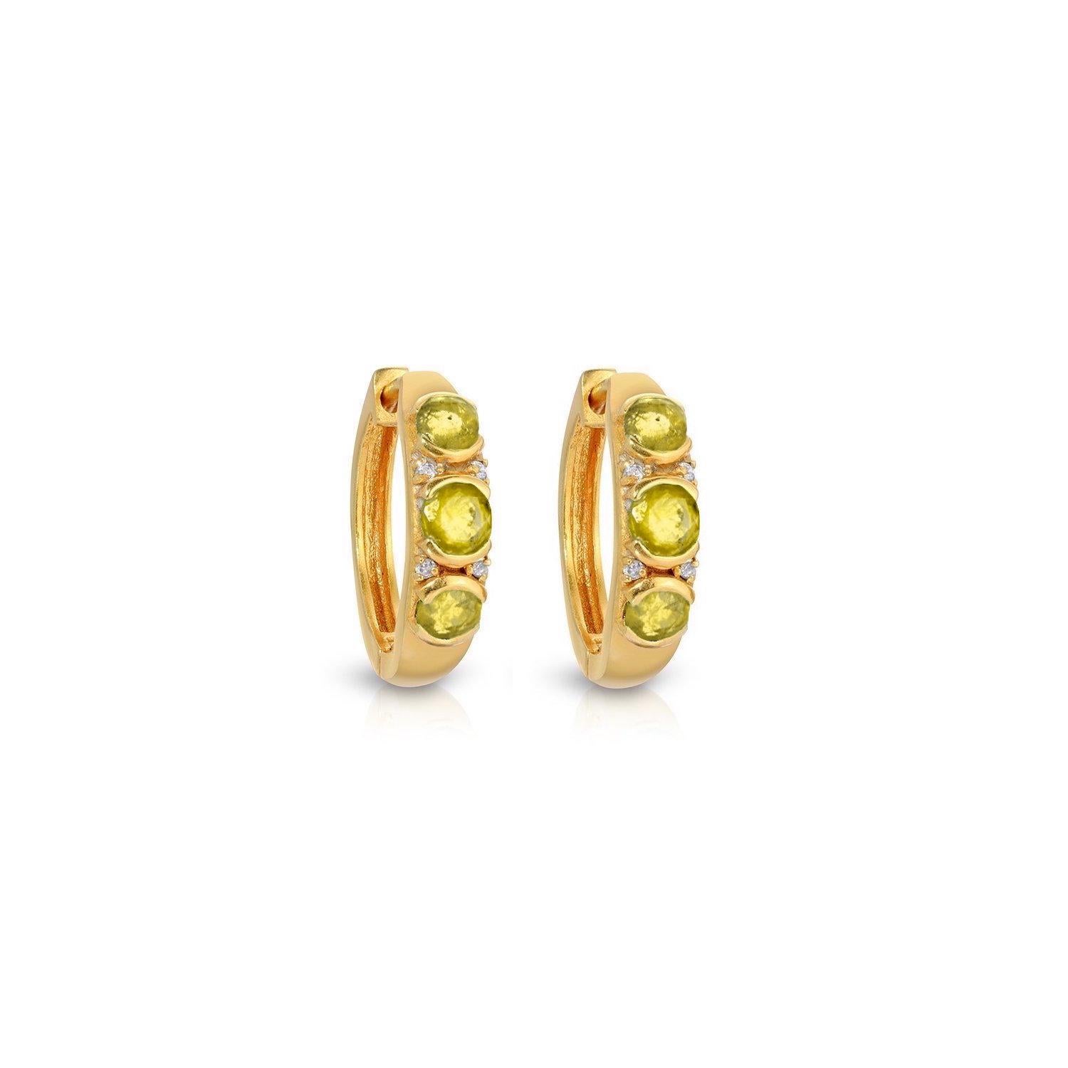 Beautiful hoop earrings in a contemporary design with a glamorous 1980's edge. These earrings feature 2.65 Carats of chunky, triple set Yellow Sapphires enhanced with .02 Carats of Brilliant Cut White Diamonds. These hoops are set in stylish 22