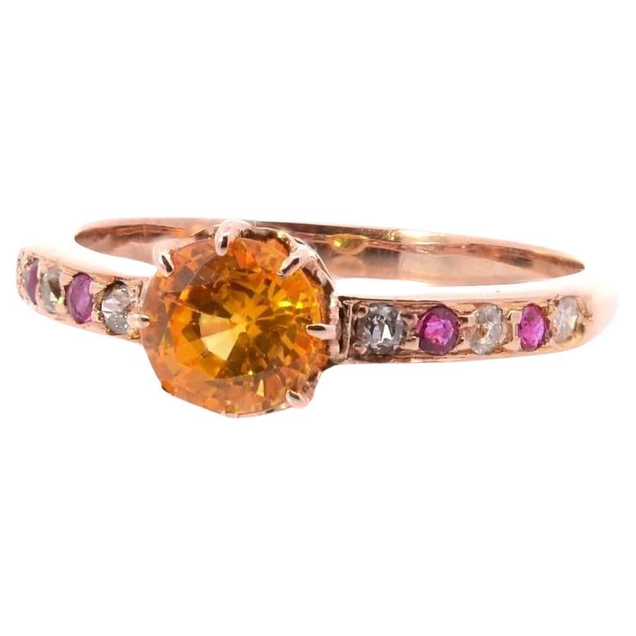 Ring aus 18 Karat Gold mit gelbem Saphir, Diamanten und rosa Saphiren