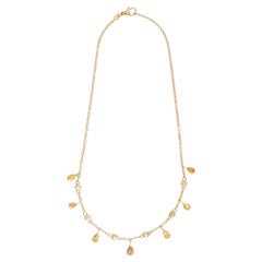 Collier en or avec gouttes de saphir jaune