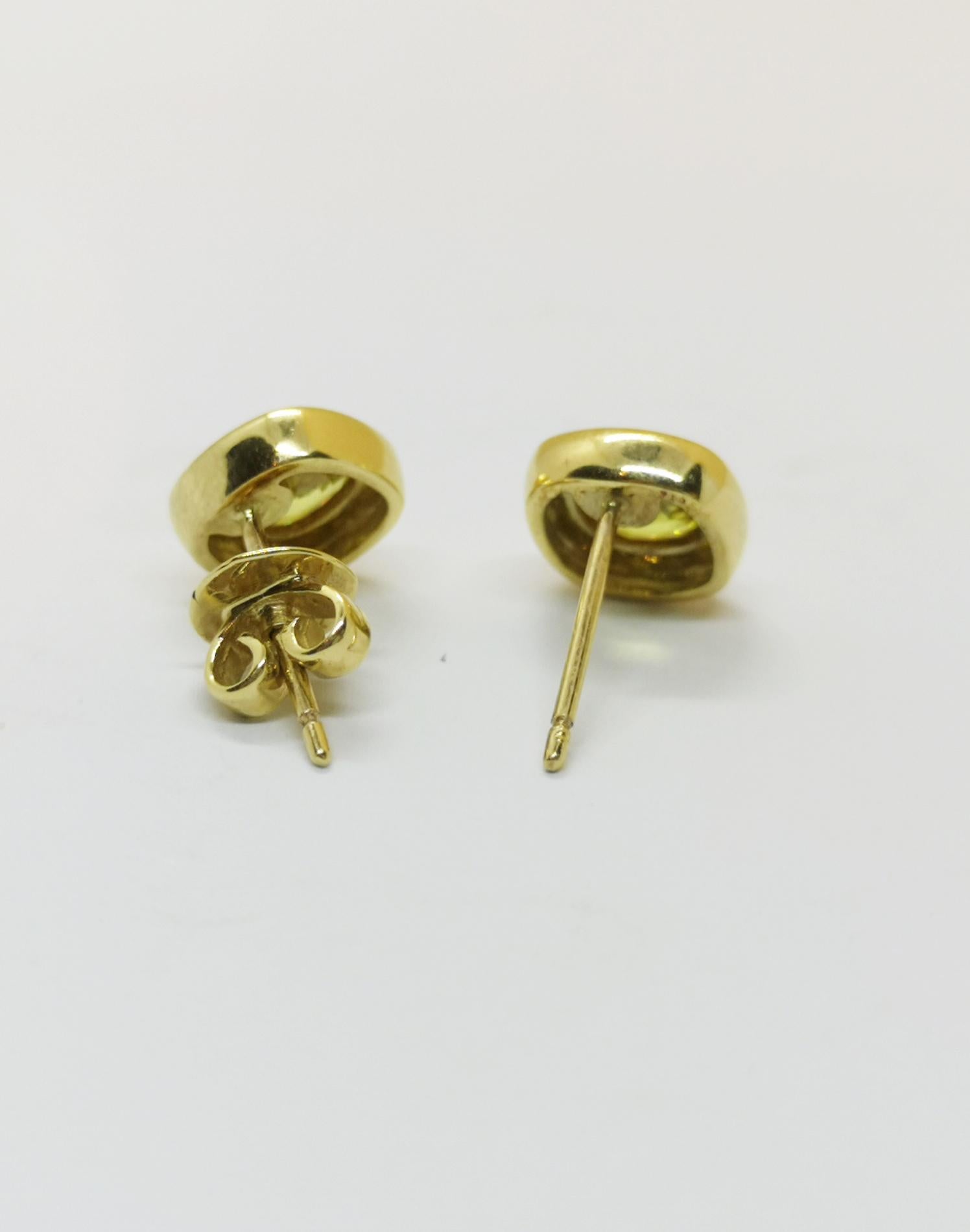 Yellow Sapphire 2.07 carats Earrings set in 18 Karat Gold Settings 

Width: 0.9 cm
Length: 0.9 cm 

