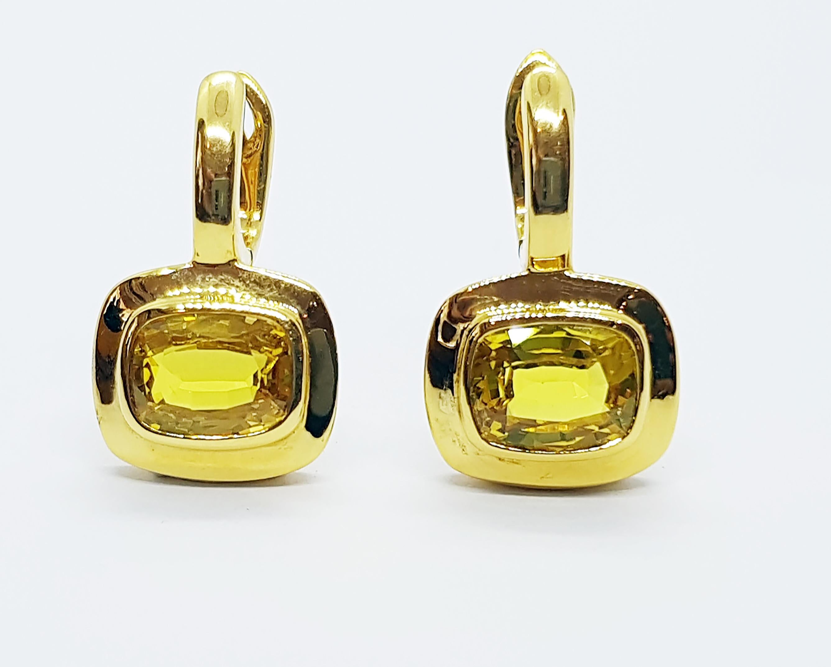 Zaffiro giallo 4,84 carati Orecchini con montatura 18  Impostazioni in oro a carati

Larghezza:  1.5 cm 
Lunghezza: 2.5 cm
Peso totale: 8.56 grammi

