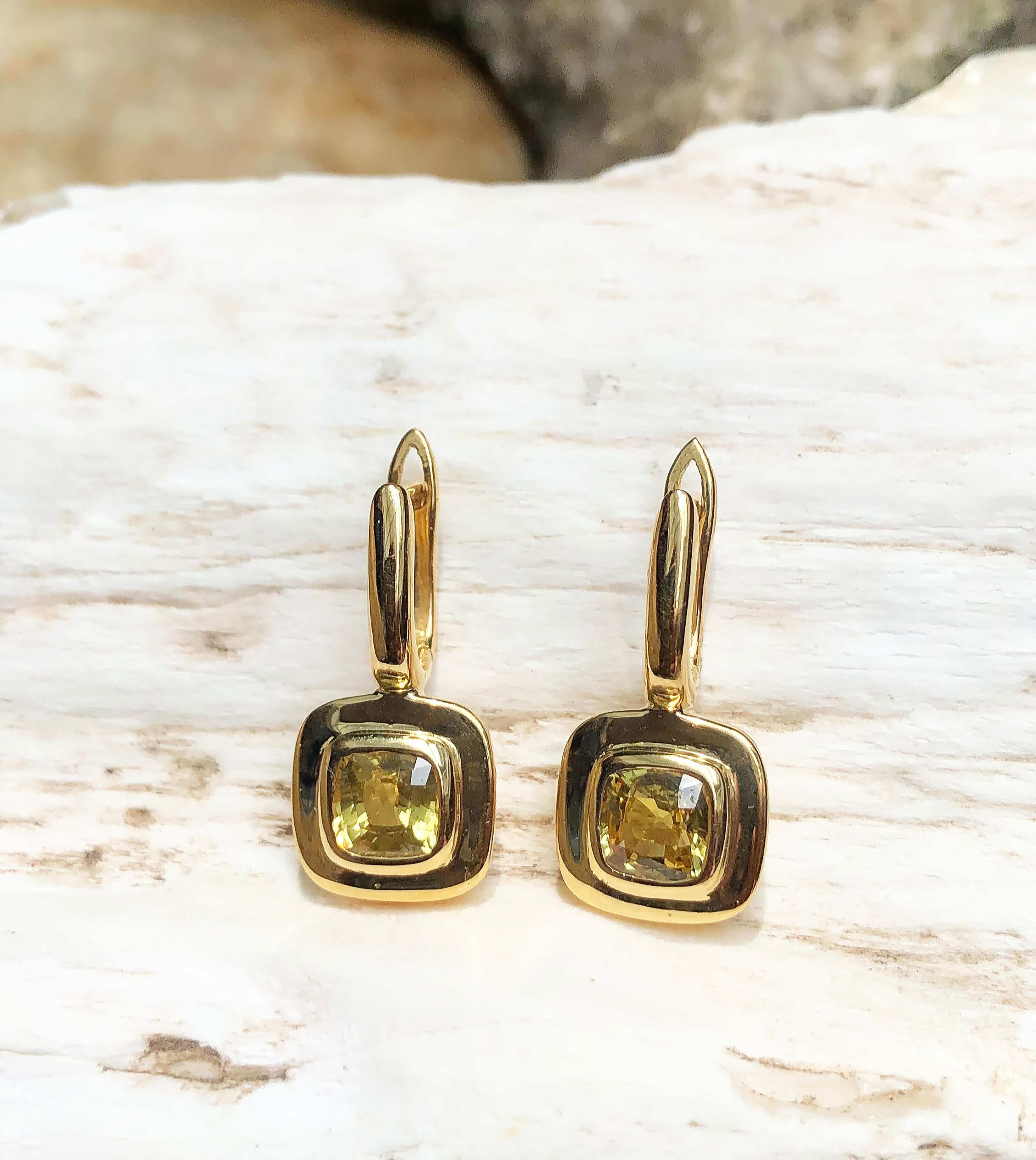 Contemporary Yellow Sapphire Earrings Set in 18 Karat Gold Settings For Sale
