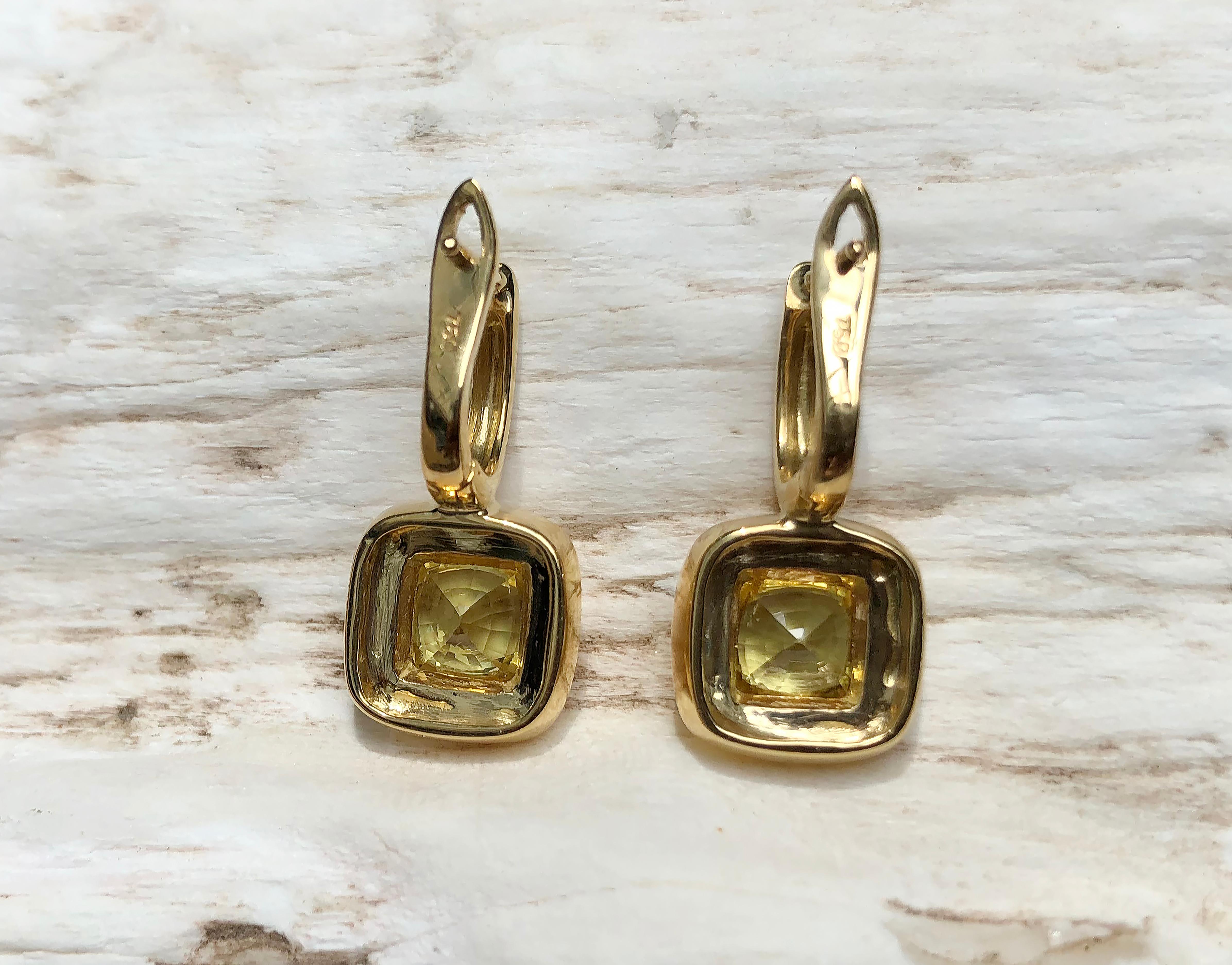 Women's Yellow Sapphire Earrings Set in 18 Karat Gold Settings For Sale