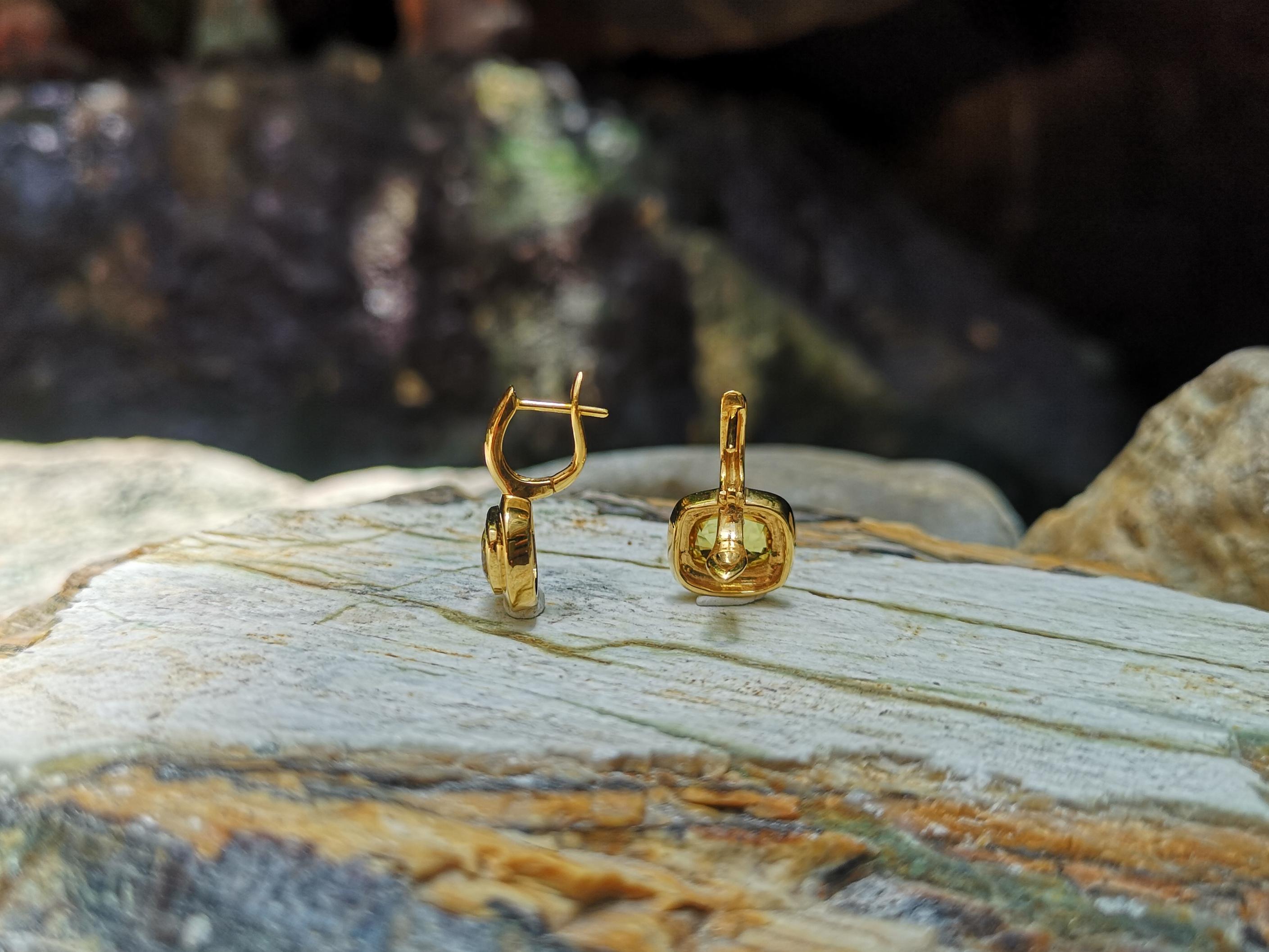 Women's Yellow Sapphire Earrings Set in 18 Karat Gold Settings For Sale