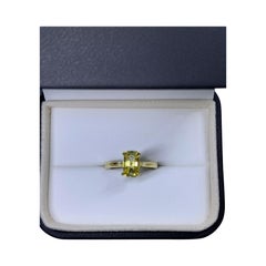 Yellow sapphire emerald engagement ring in 18k yellow gold.