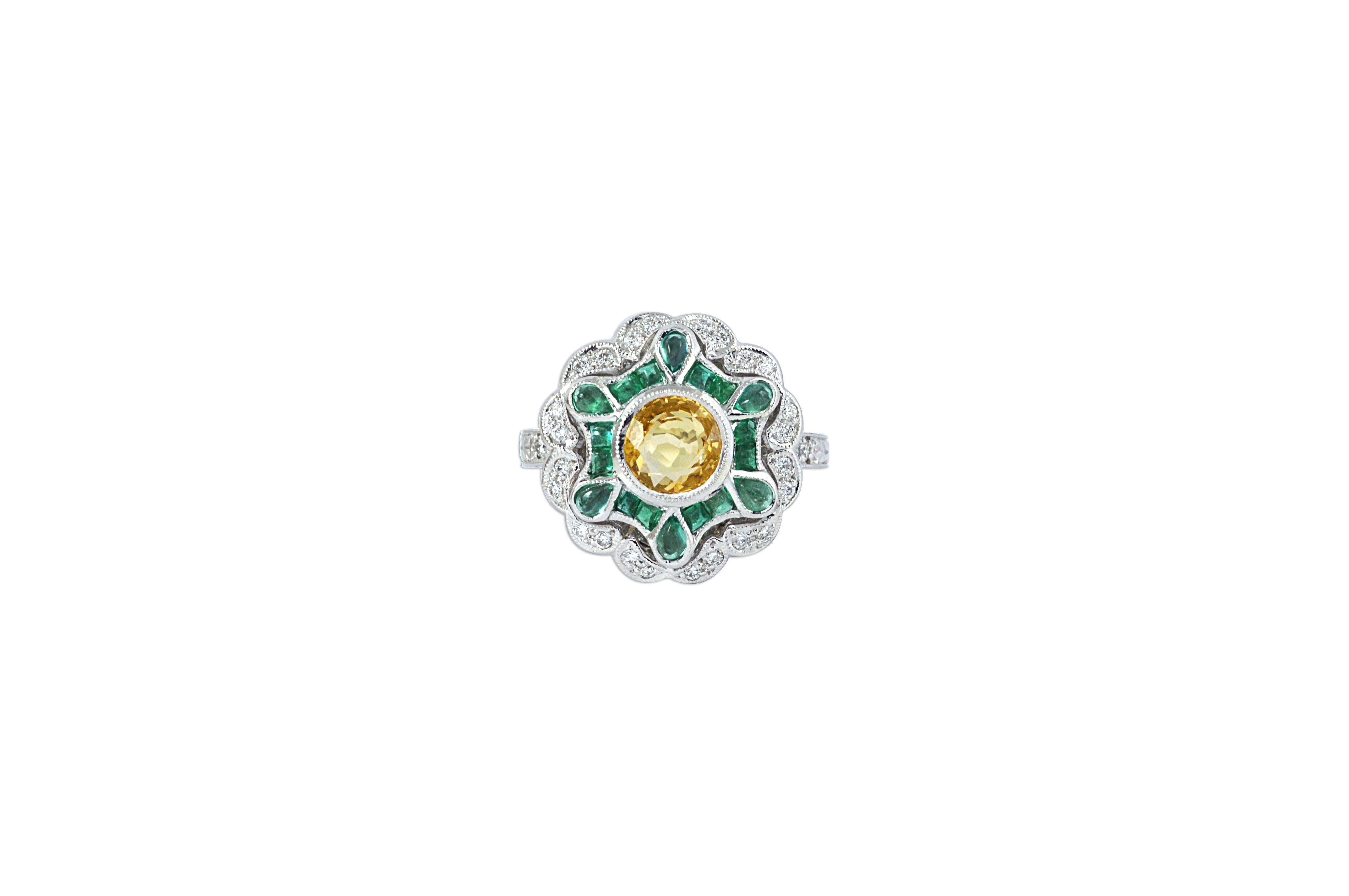 Yellow Sapphire 1.72 carats with Emerald 1.23 carats with Diamond 0.29 carat Ring set in 18 Karat White Gold Settings

Width: 2 cm
Length: 2 cm 
Ring Size:  54


