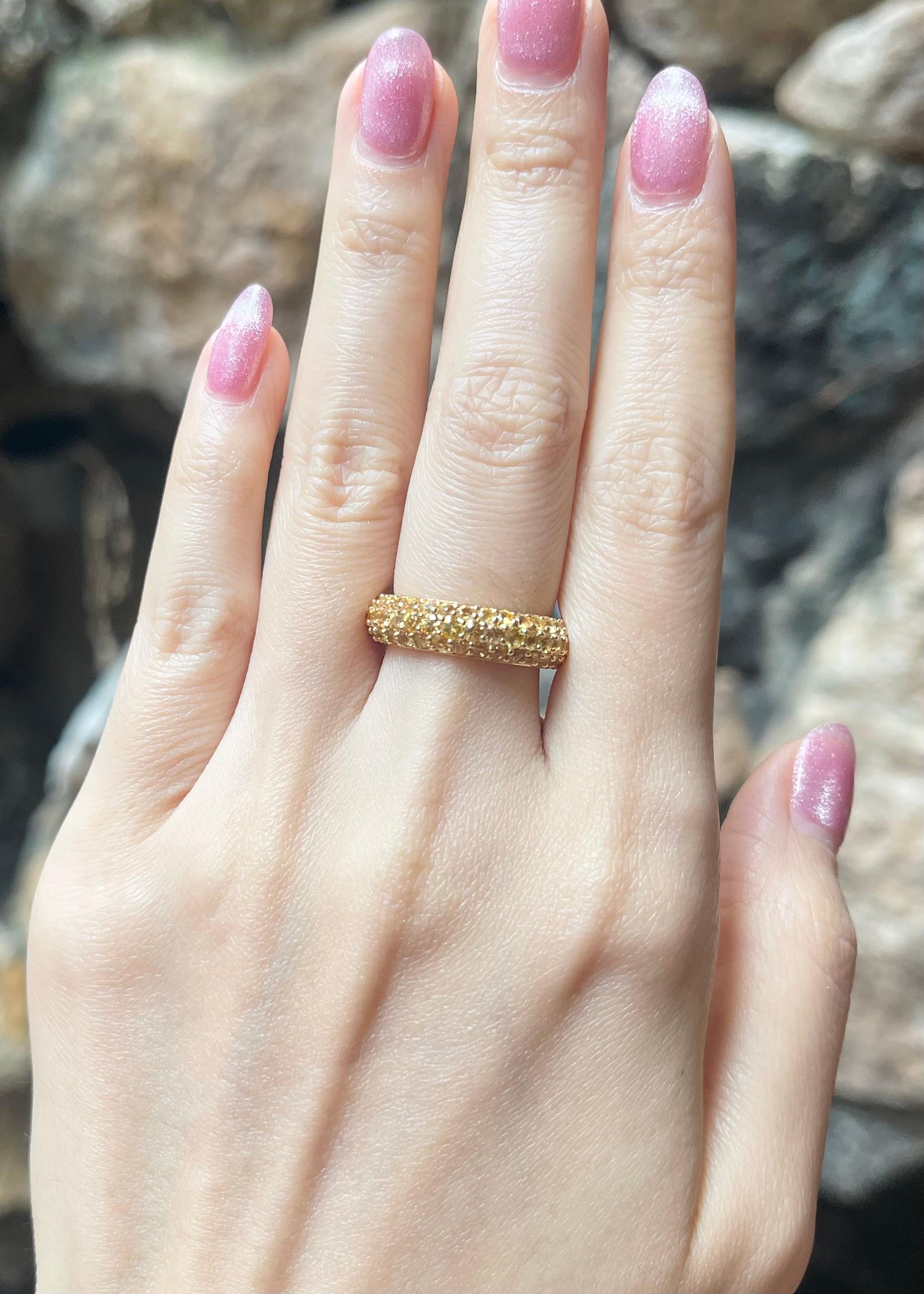 Yellow Sapphire 3.70 carats Eternity Ring set in 18K Gold Settings

Width:  2.4 cm 
Length: 0.6 cm
Ring Size: 52
Total Weight: 6.92 grams

