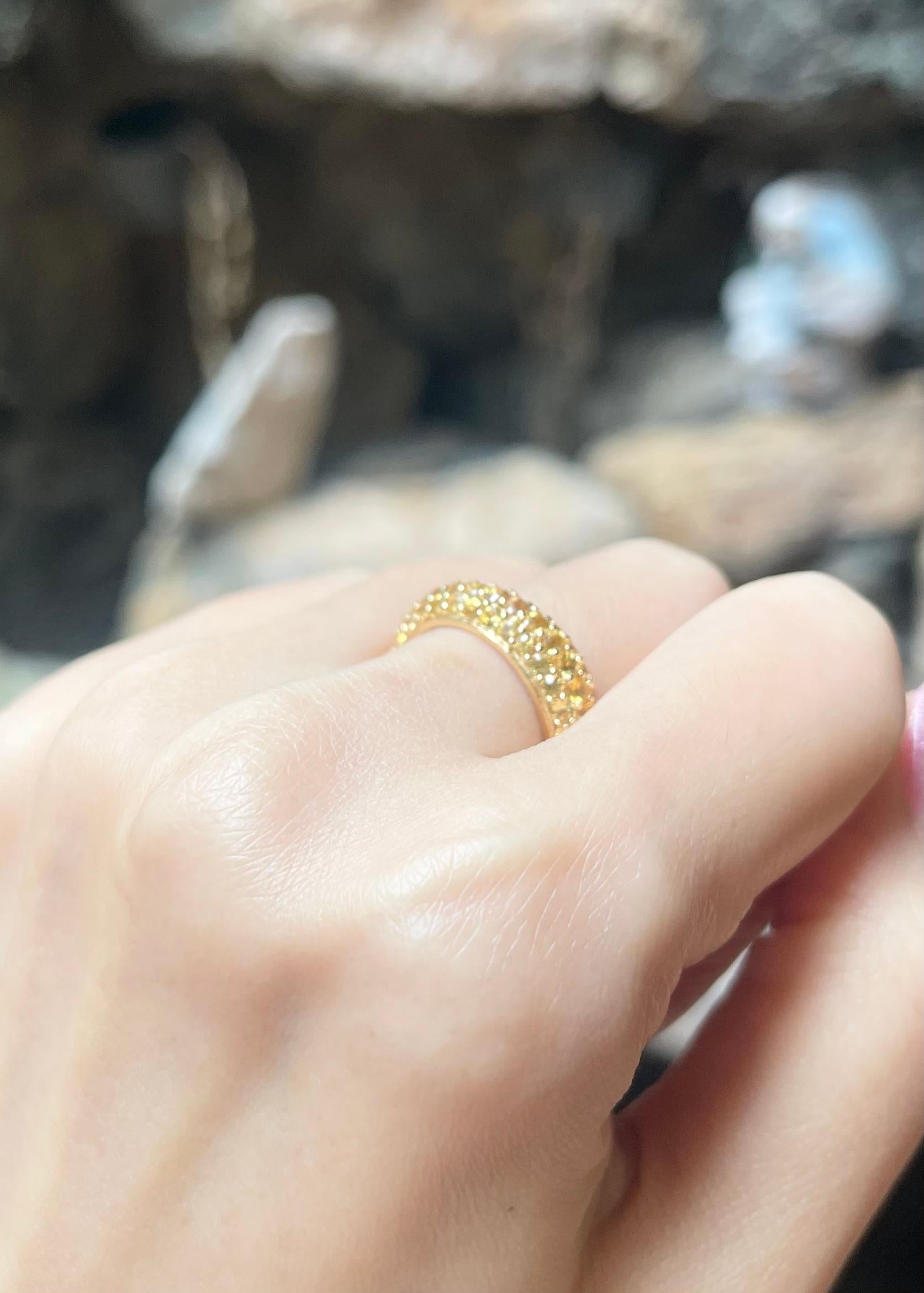 Women's or Men's Yellow Sapphire Eternity Ring set in 18K Gold Settings For Sale