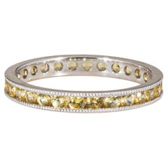 Anello di eternità con zaffiro giallo Sz 7.5 in oro bianco 18 ct.
