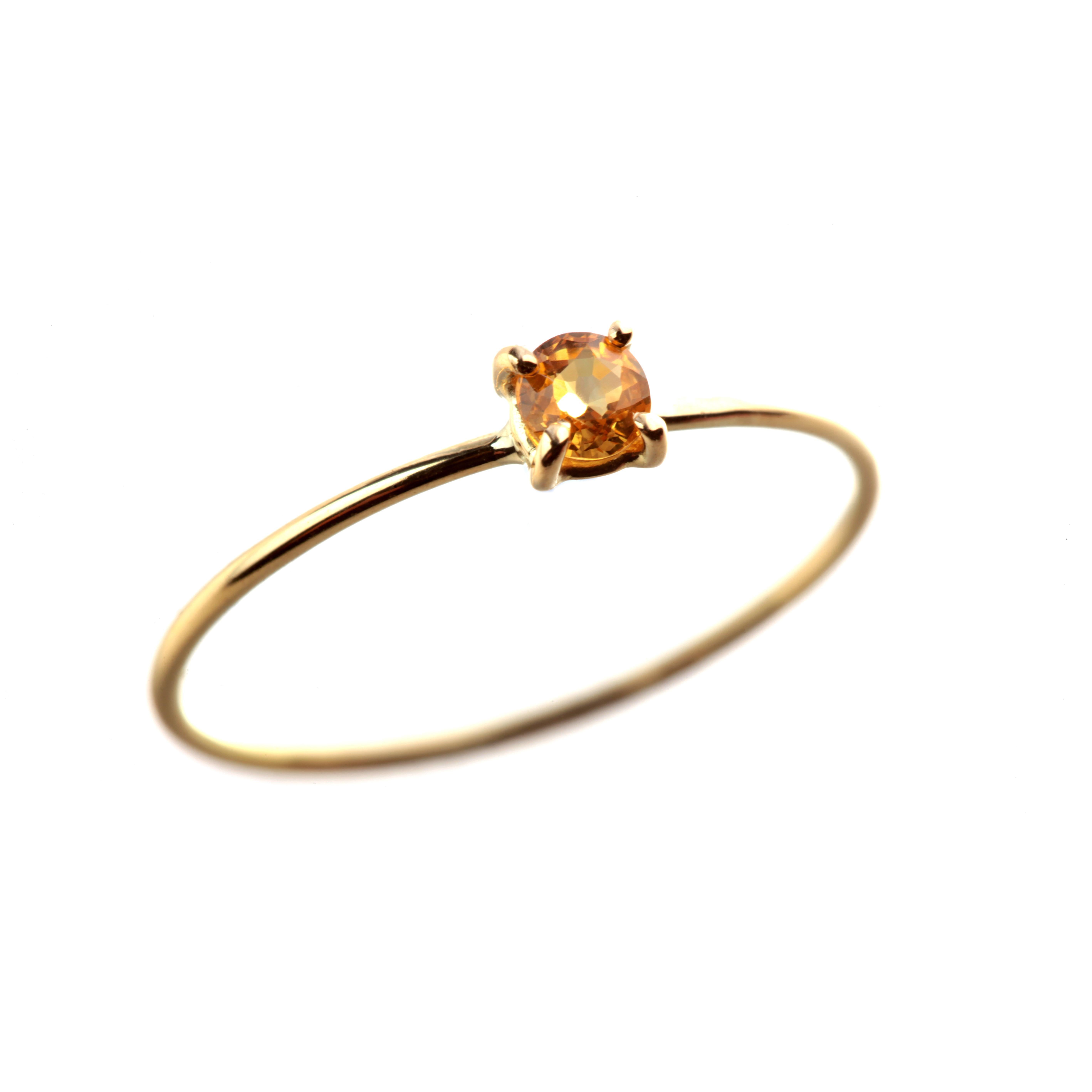 Signature INTINI Jewels yellow sapphire jewellery. Modern and elegant ring design in 18k yellow gold with an brilliant cut with tiny griffes sormounting the ring.

Yellow Sapphire represents divine grace and power. It is considered to be one of the