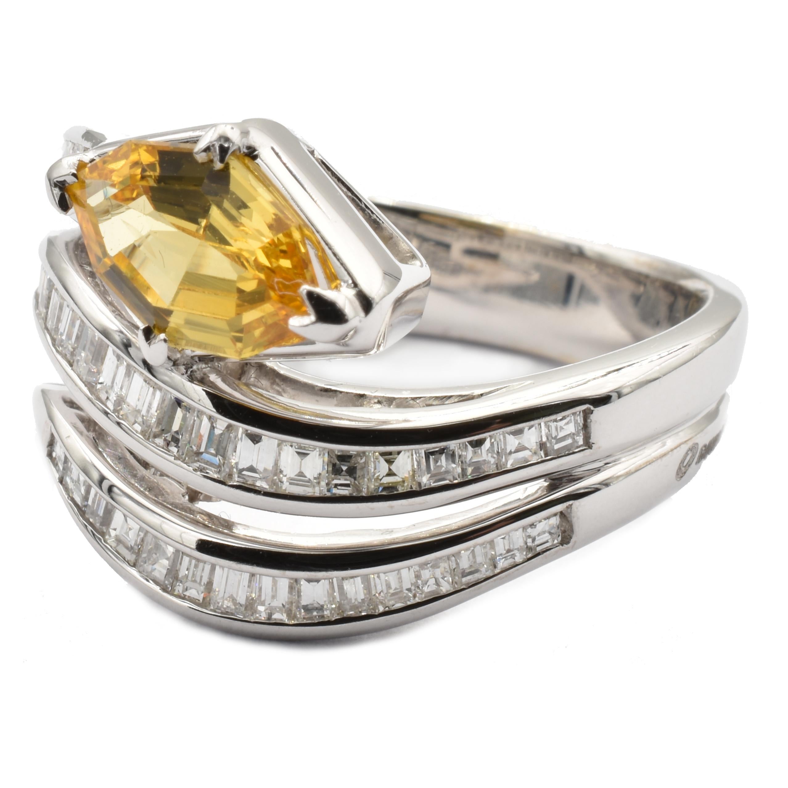 Gilberto Cassola 18Kt White Gold Snake Ring with a Yellow Sapphire Marquise and Carrè Diamonds.
Handmade in our Atelier in Valenza Italy.
Bright Yellow Sapphire Marquise sized mm 9.00 X 5.90.  Weight ct 1.95
G Color Vs Clarity Carrè Diamonds ct