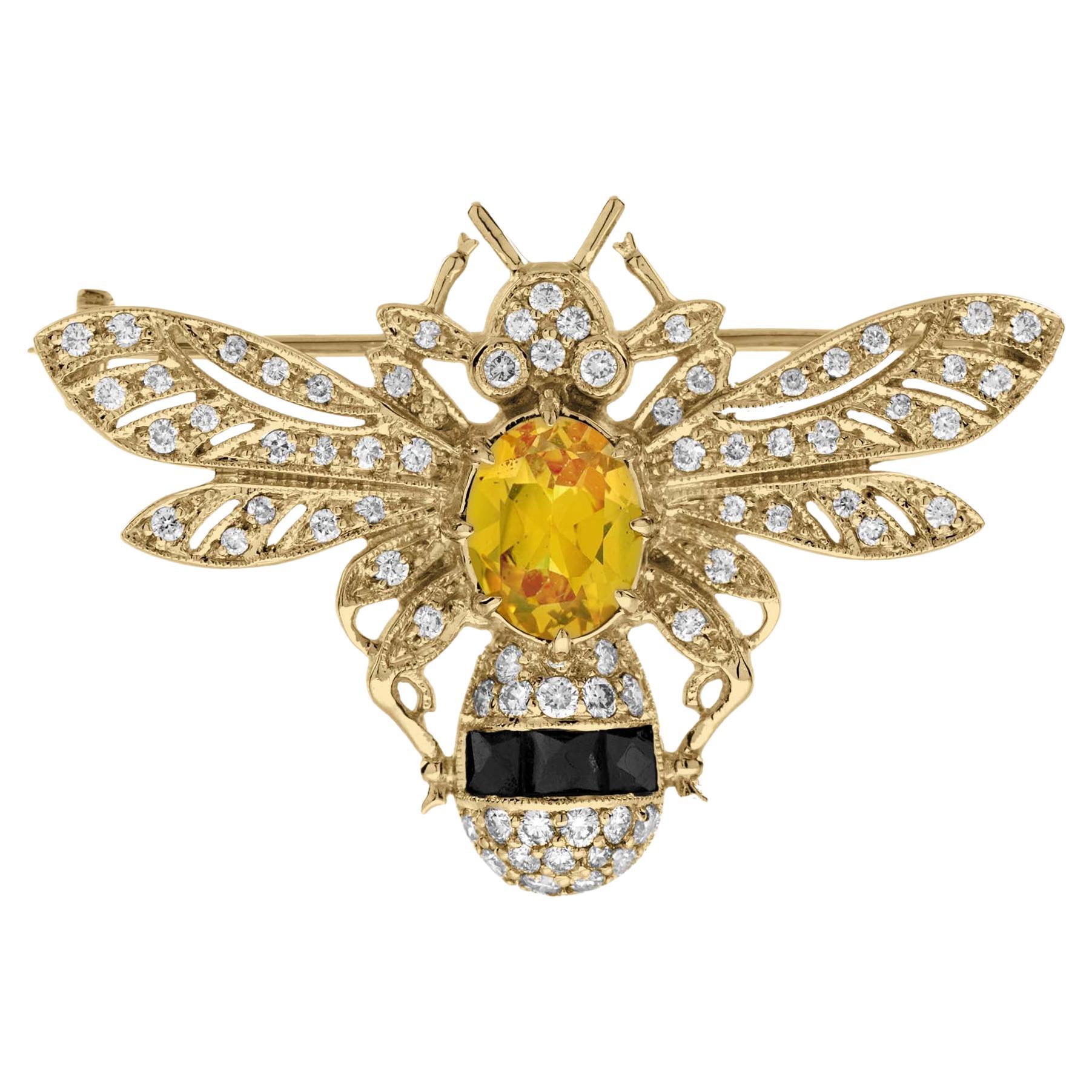 Broche abeille en or jaune 18 carats, saphir jaune, onyx et diamant de style Art Déco