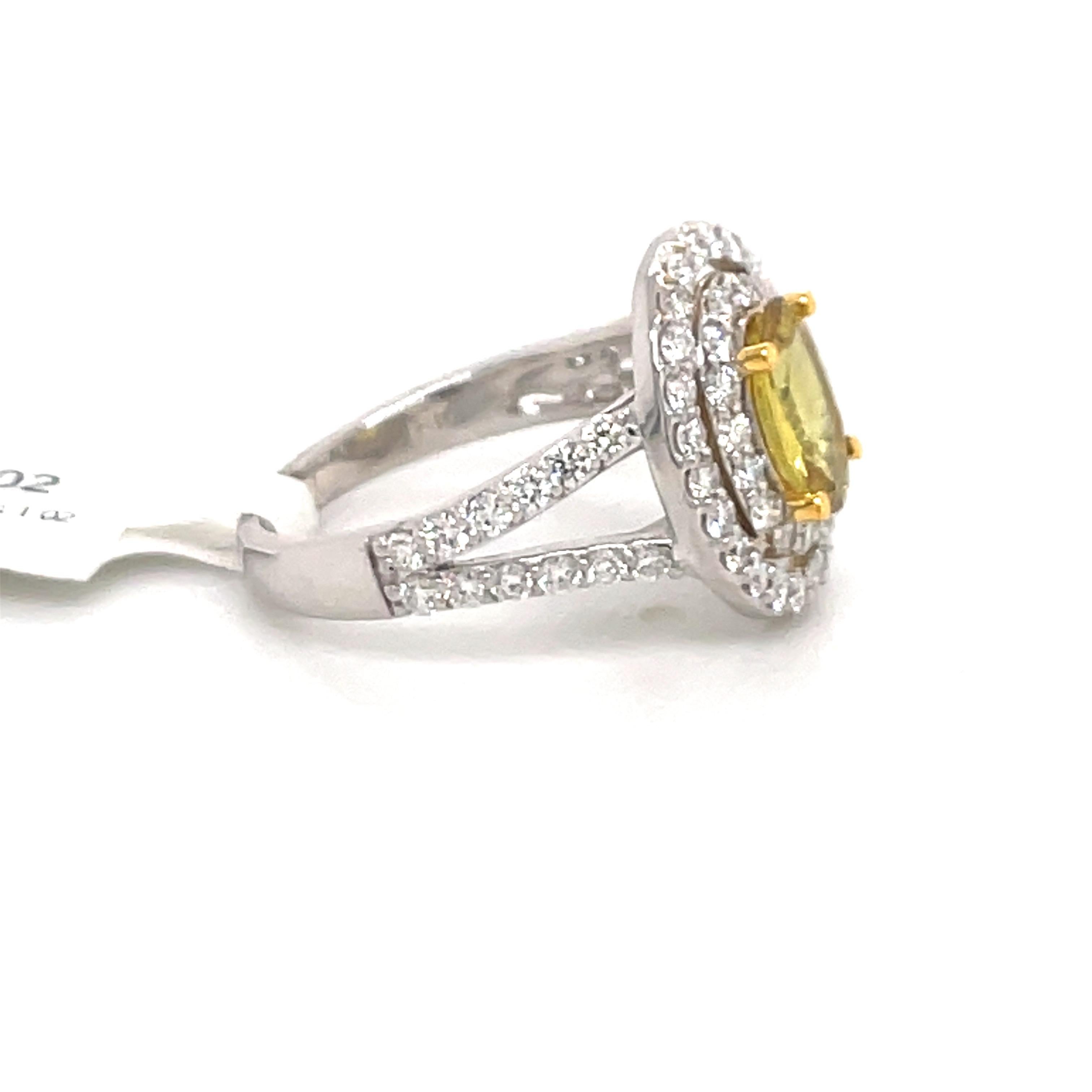 Contemporary Yellow Sapphire Oval Double Halo Engagement Ring 2.18 Carat 18 Carat White Gold