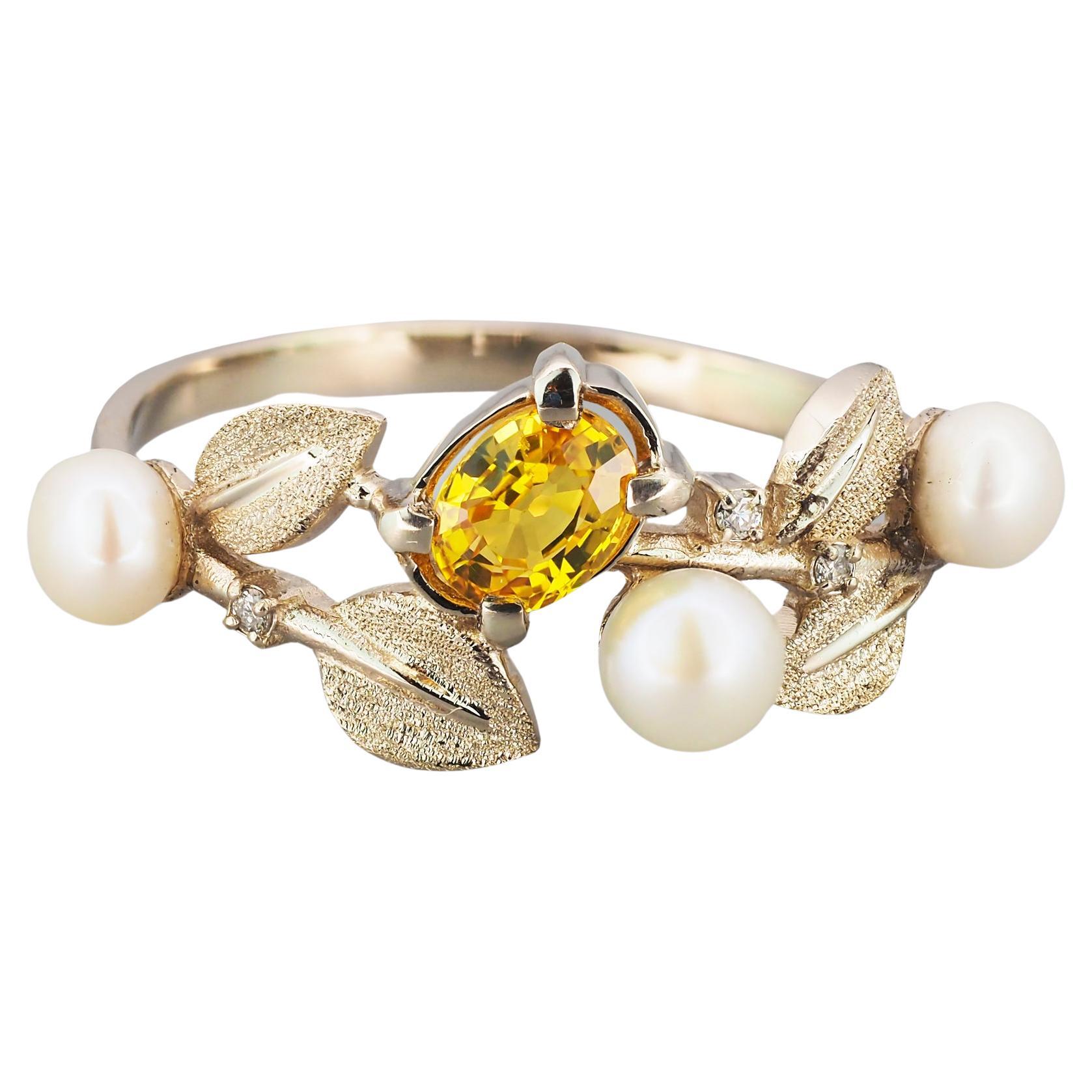 Yellow sapphire, pearl, diamonds 14k gold ring. 