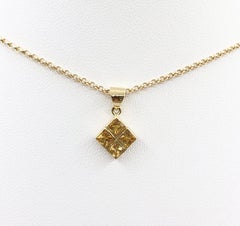 Yellow Sapphire Pendant set in 18 Karat Gold Settings