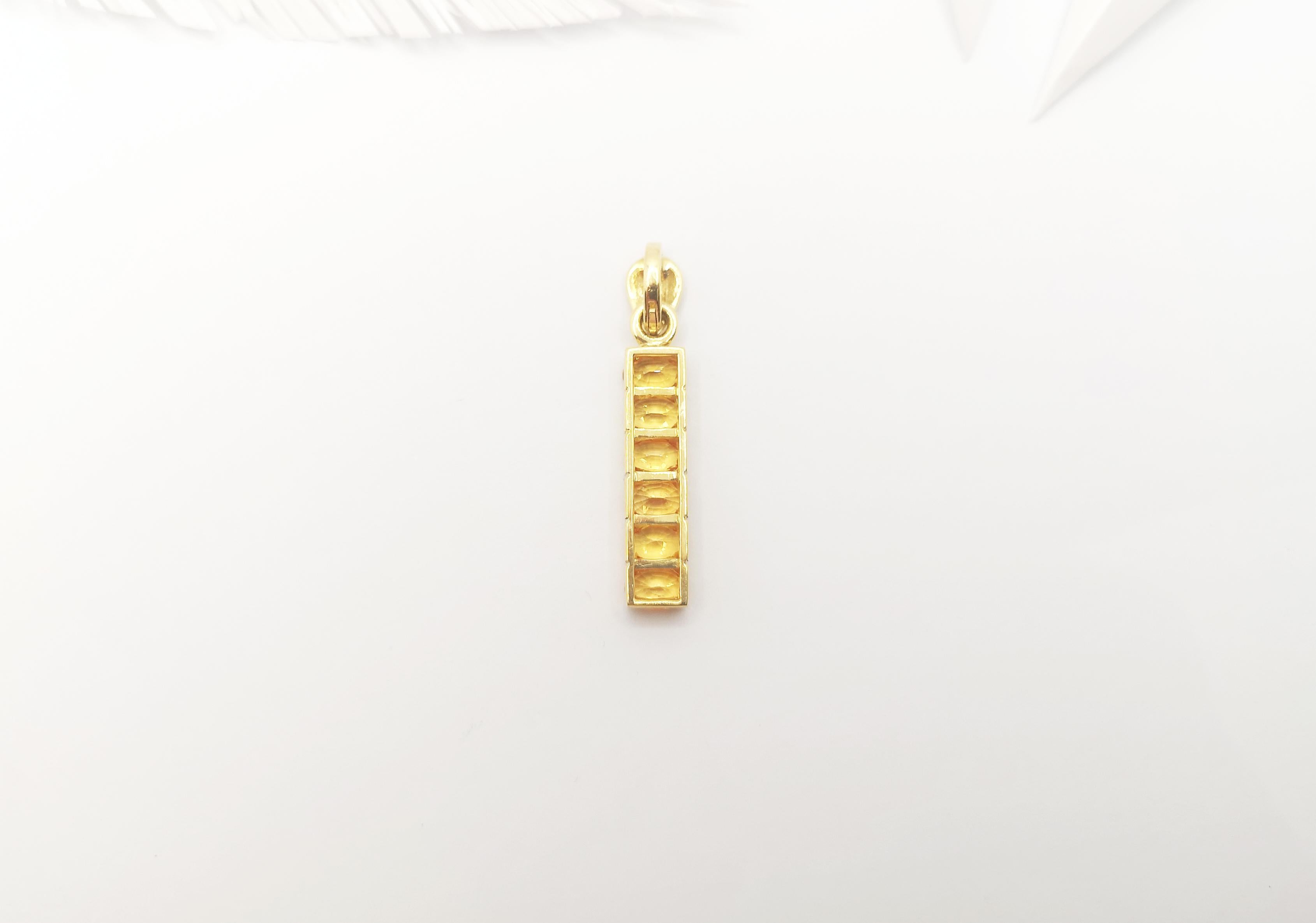 Oval Cut Yellow Sapphire Pendant Set in 18 Karat Gold Settings For Sale