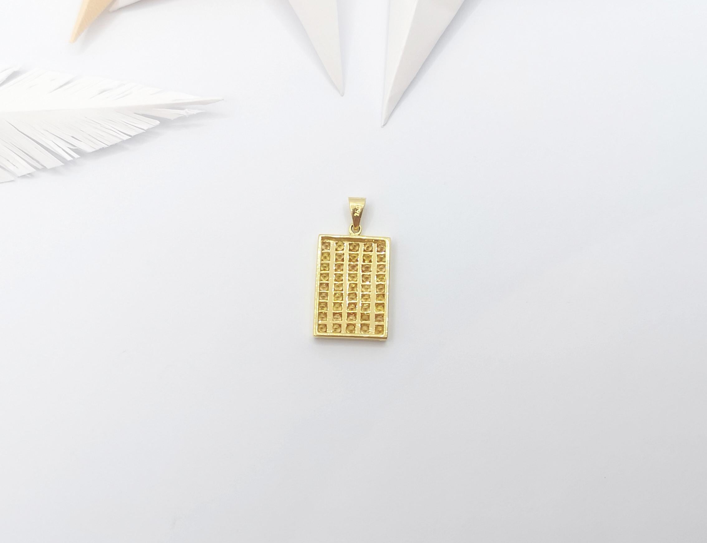 Pendentif en saphir jaune serti dans des montures en or 18 carats Unisexe en vente