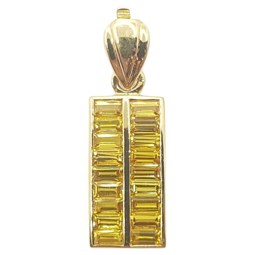 Pendentif en saphir jaune serti dans des montures en or 18 carats