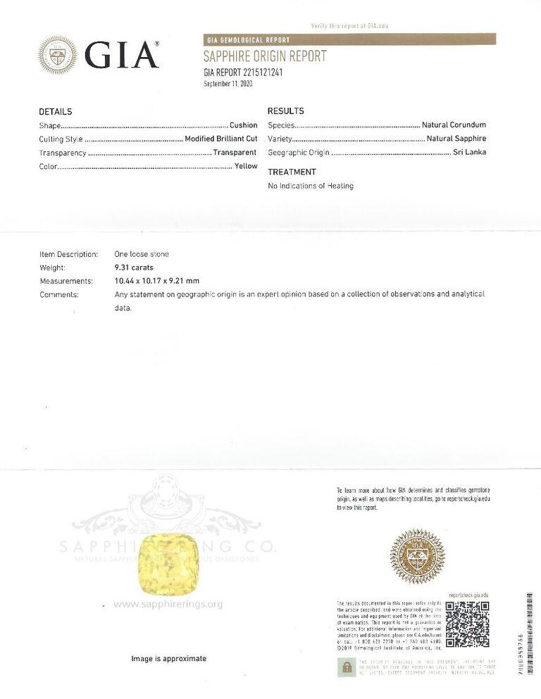 New Ring aus Platin mit einem gelben Saphir im Kissenschliff mit den Maßen 10,44 x 10,17 x 9,21 mm und einem Gewicht von 9,31 Karat.  Typ II. Mittelhelle, mäßig starke, gelbe Farbe GIA Y 4/4.   Set mit 2 Birnenschliff GIA zertifiziert Diamanten bei