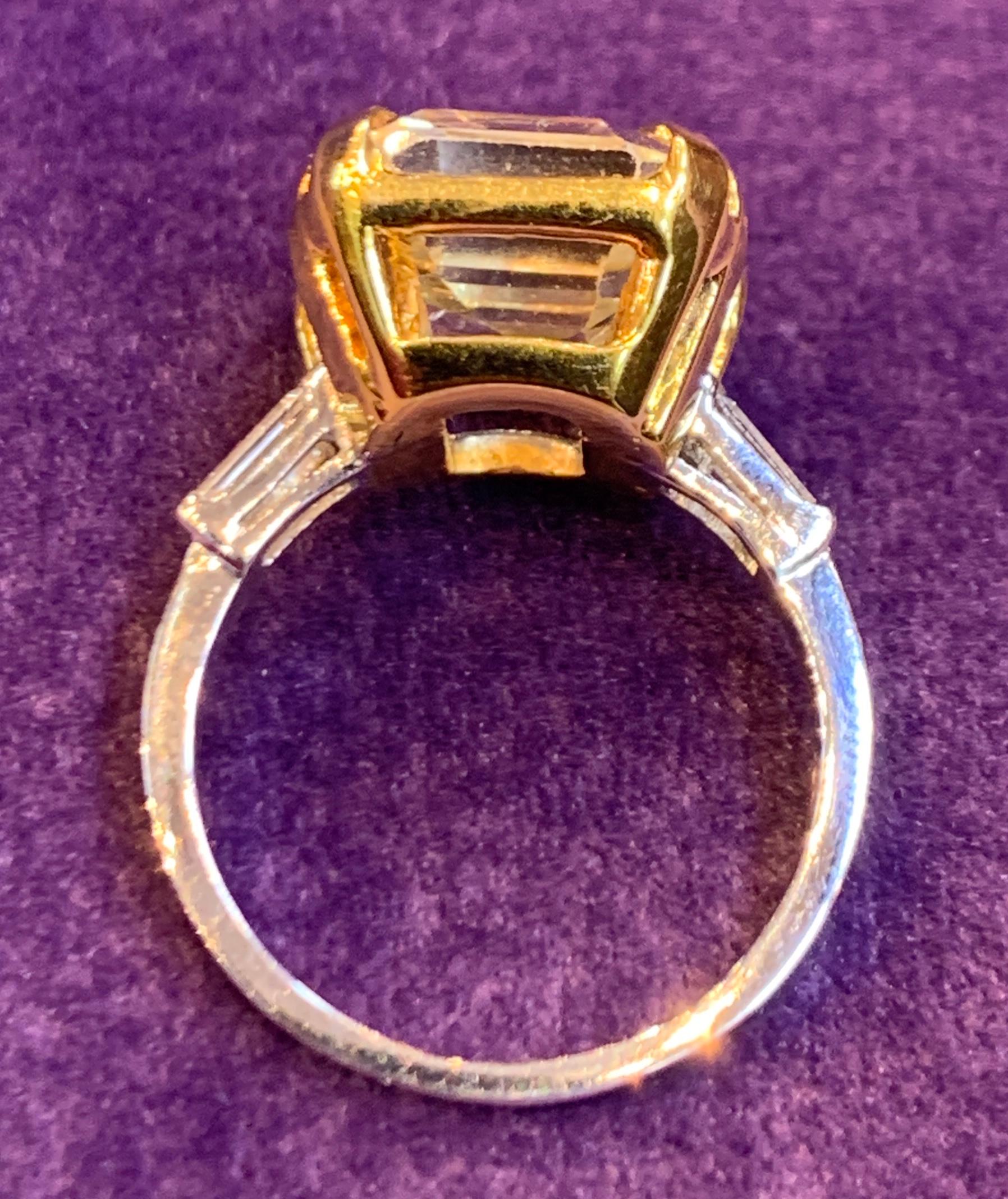 Yellow Sapphire Ring set in Platinum & 18K Yellow Gold 
Sapphire Weight approximately 5 carats
Ring Size: 6.5
Resizable free of charge 
