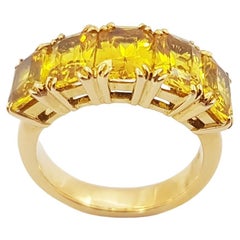 Bague en saphir jaune sertie dans des montures en or 18 carats