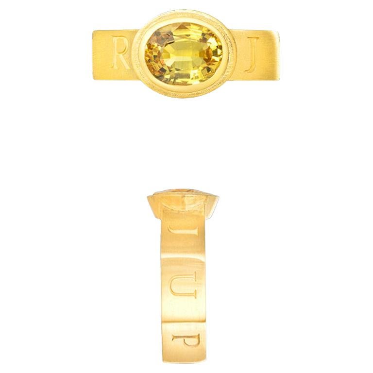 Bague en saphir jaune sertie dans un anneau Jupiter 14 carats  en vente